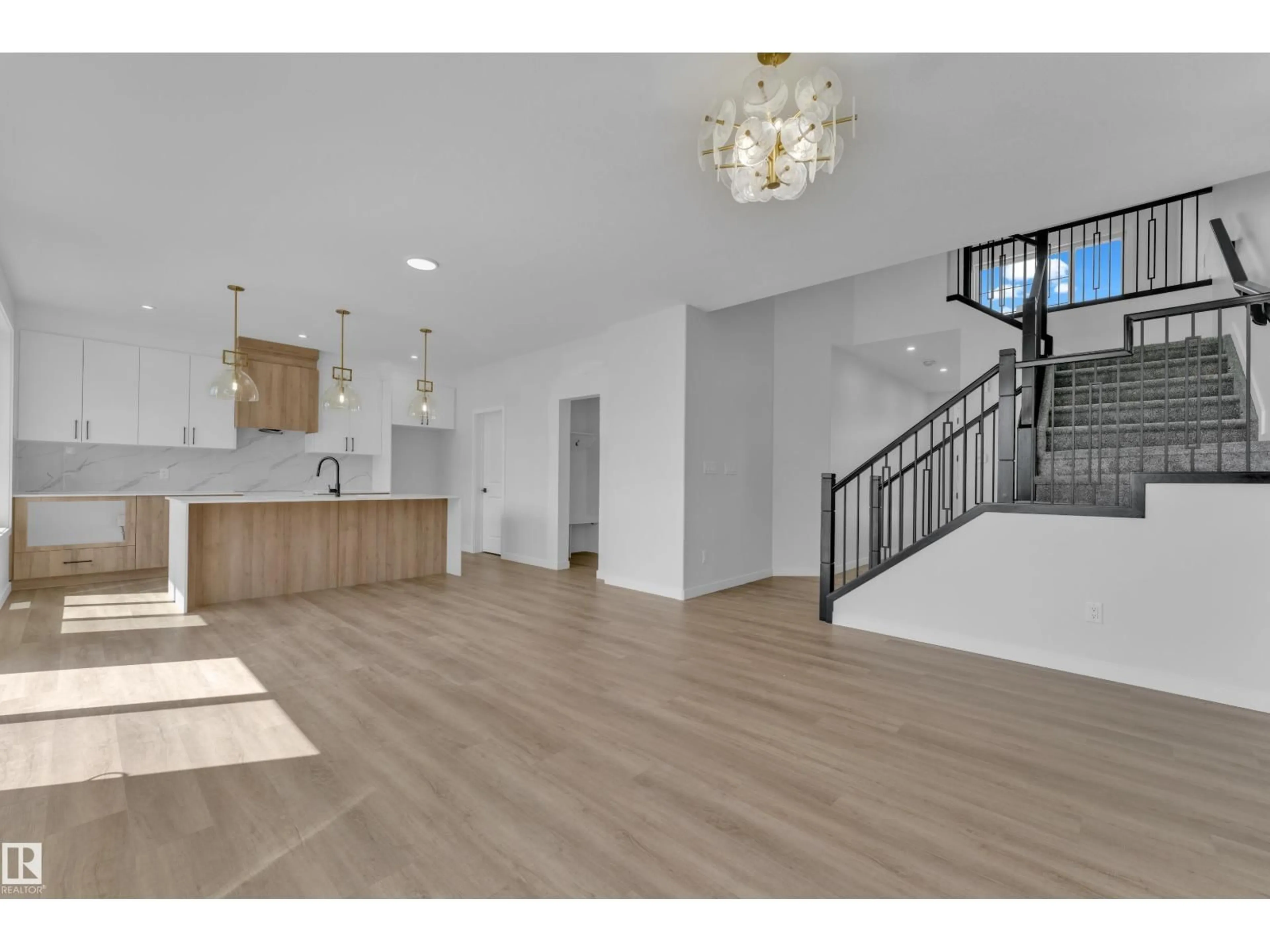 Open concept kitchen, wood/laminate floor for 117 CALVINIA LI, Sherwood Park Alberta T8A4V2