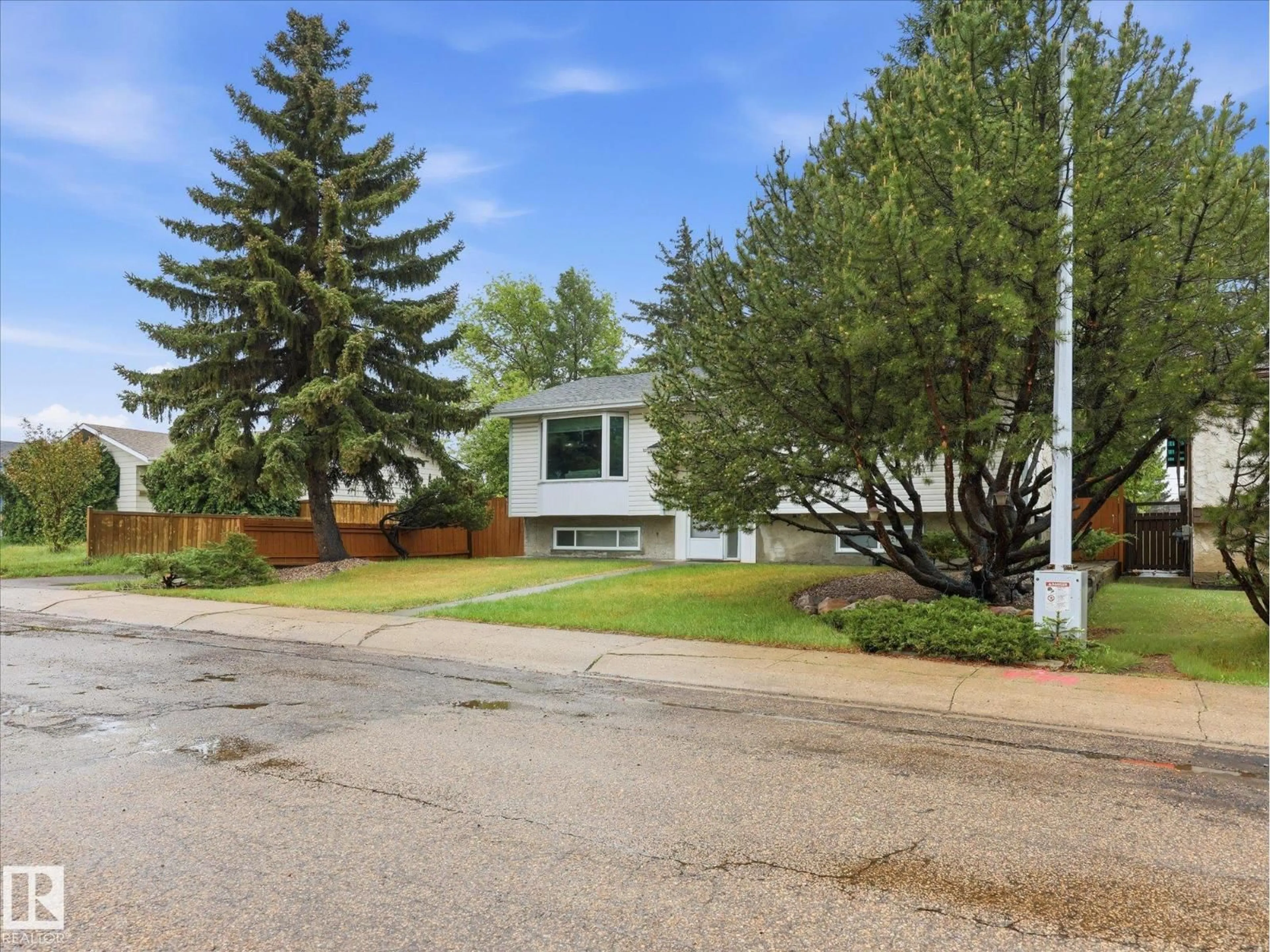 Home with vinyl exterior material, street for 3548 65 ST, Edmonton Alberta T6L1G4