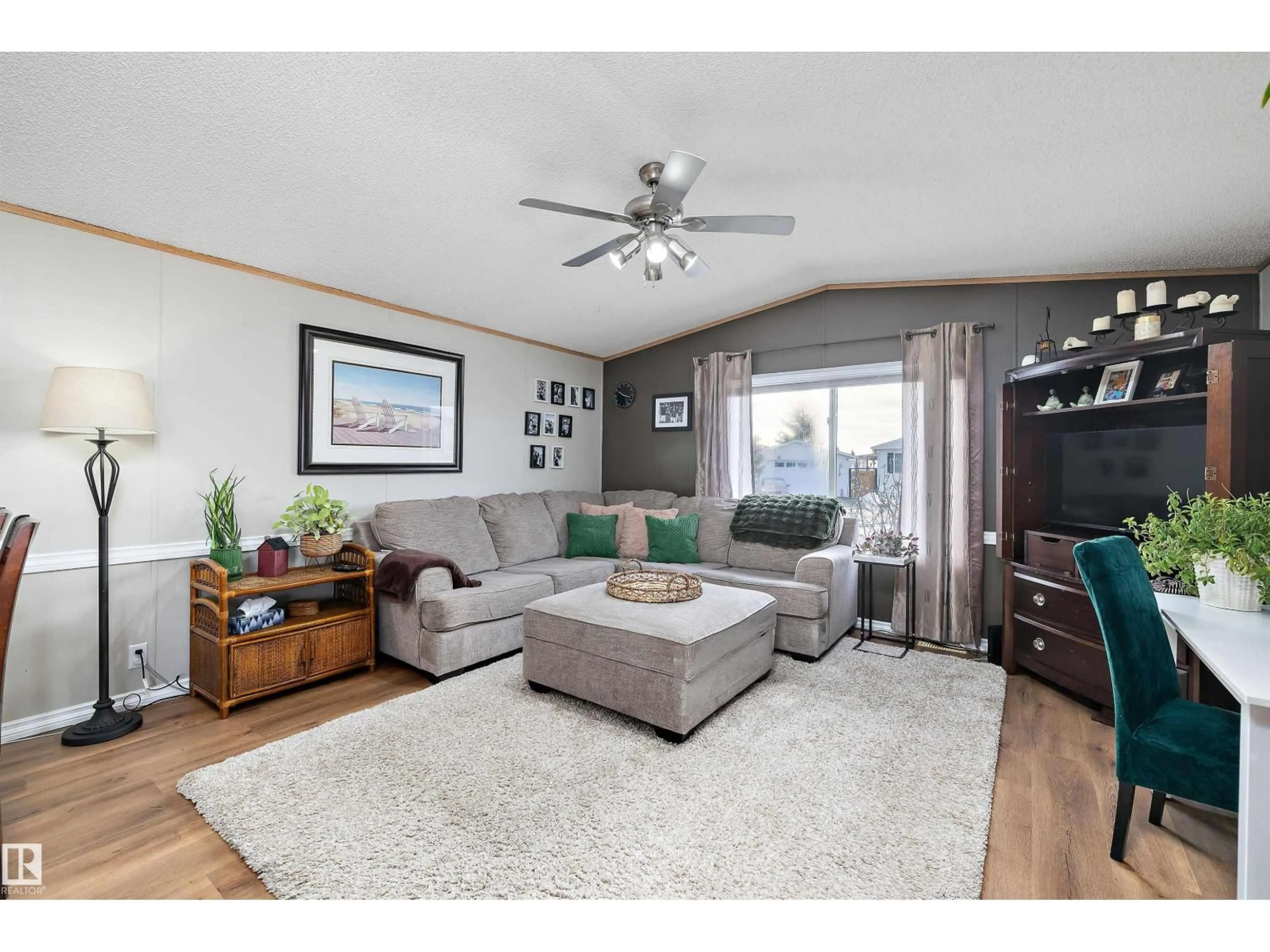 Living room with furniture, wood/laminate floor for #161 - 3400 48 ST, Stony Plain Alberta T7Z1R9