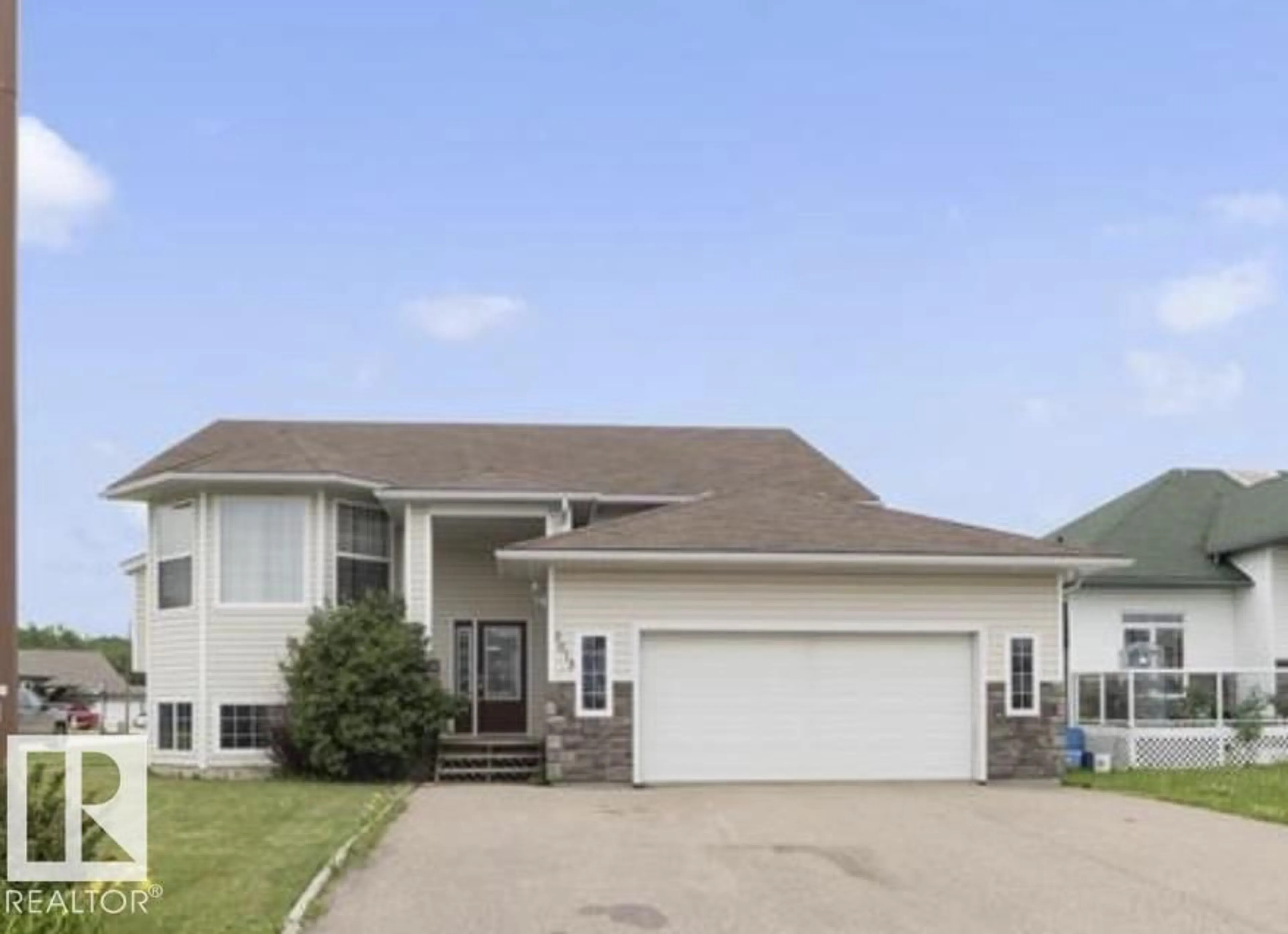 Home with vinyl exterior material, street for 2613 6 AV, Cold Lake Alberta T9M2C7