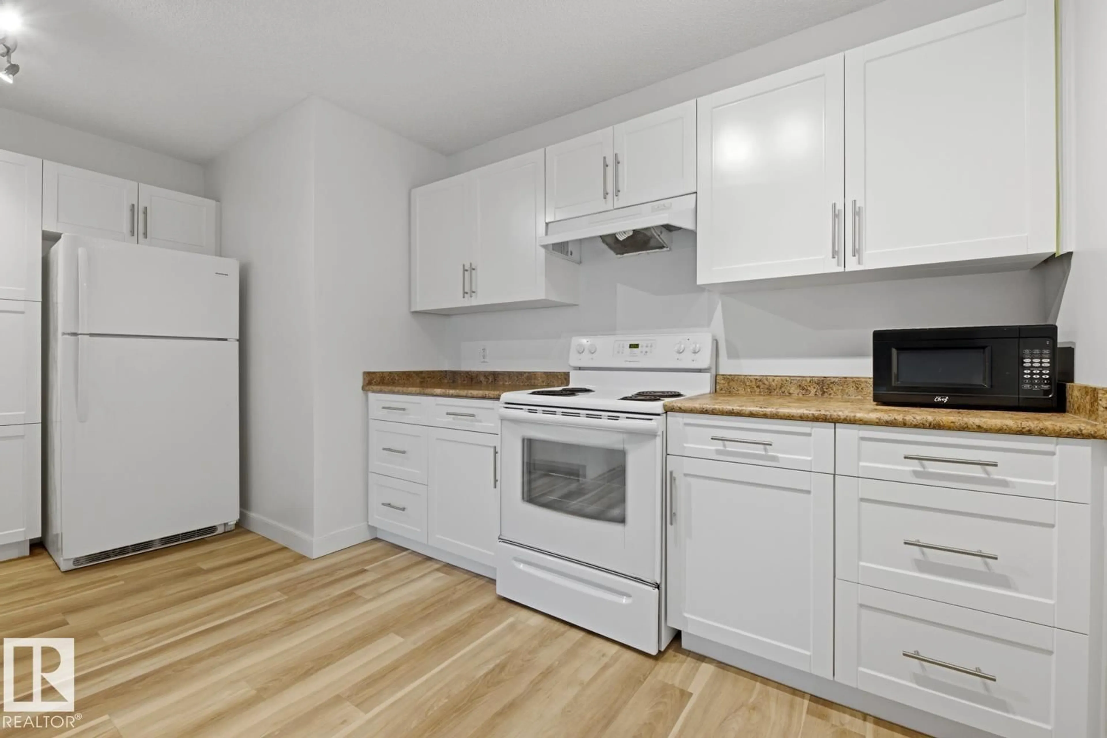 Standard kitchen, wood/laminate floor for #703 - 9710 105 ST, Edmonton Alberta T5K1A3
