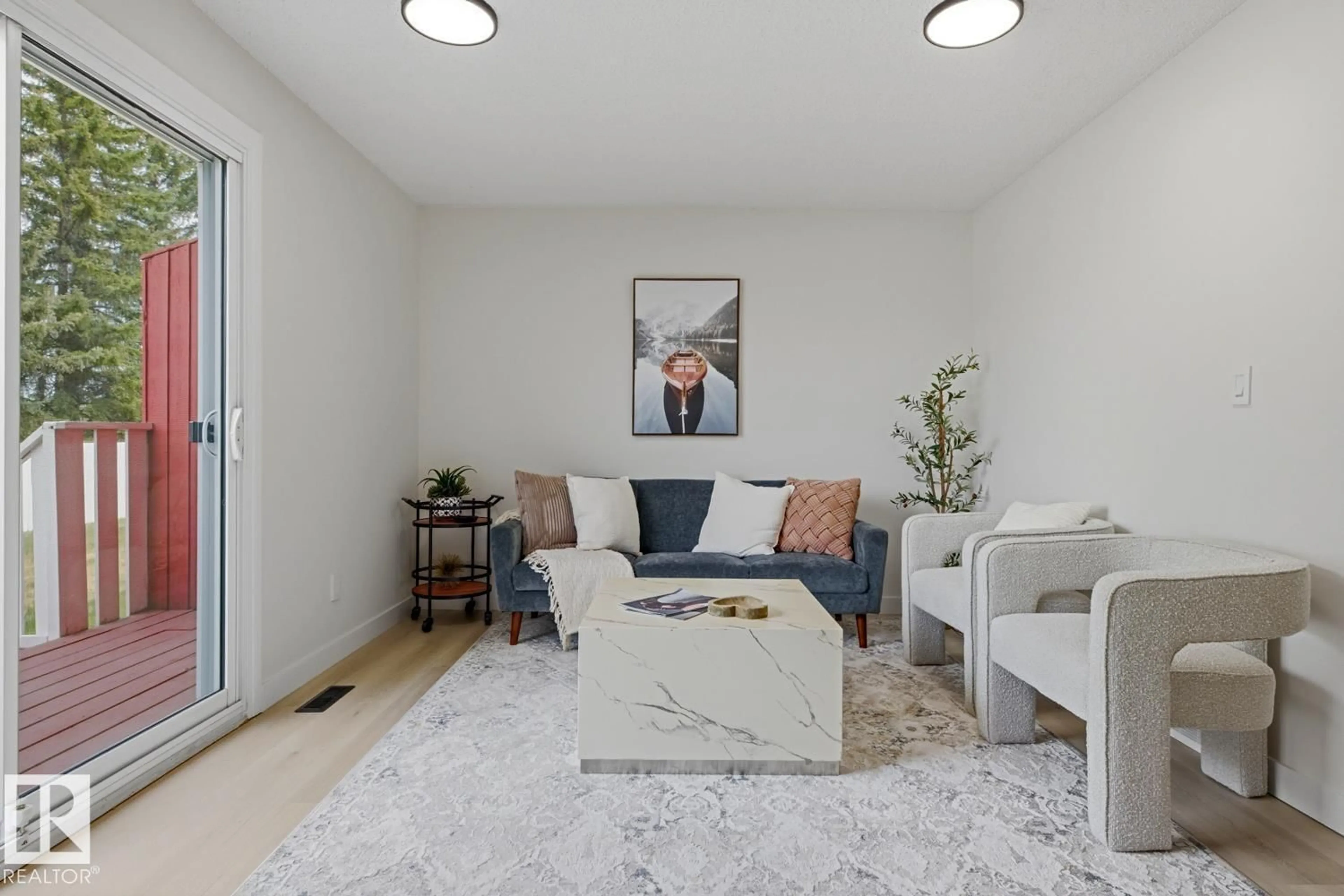 Living room with furniture, unknown for 10684 BEAUMARIS RD, Edmonton Alberta T5X3N4