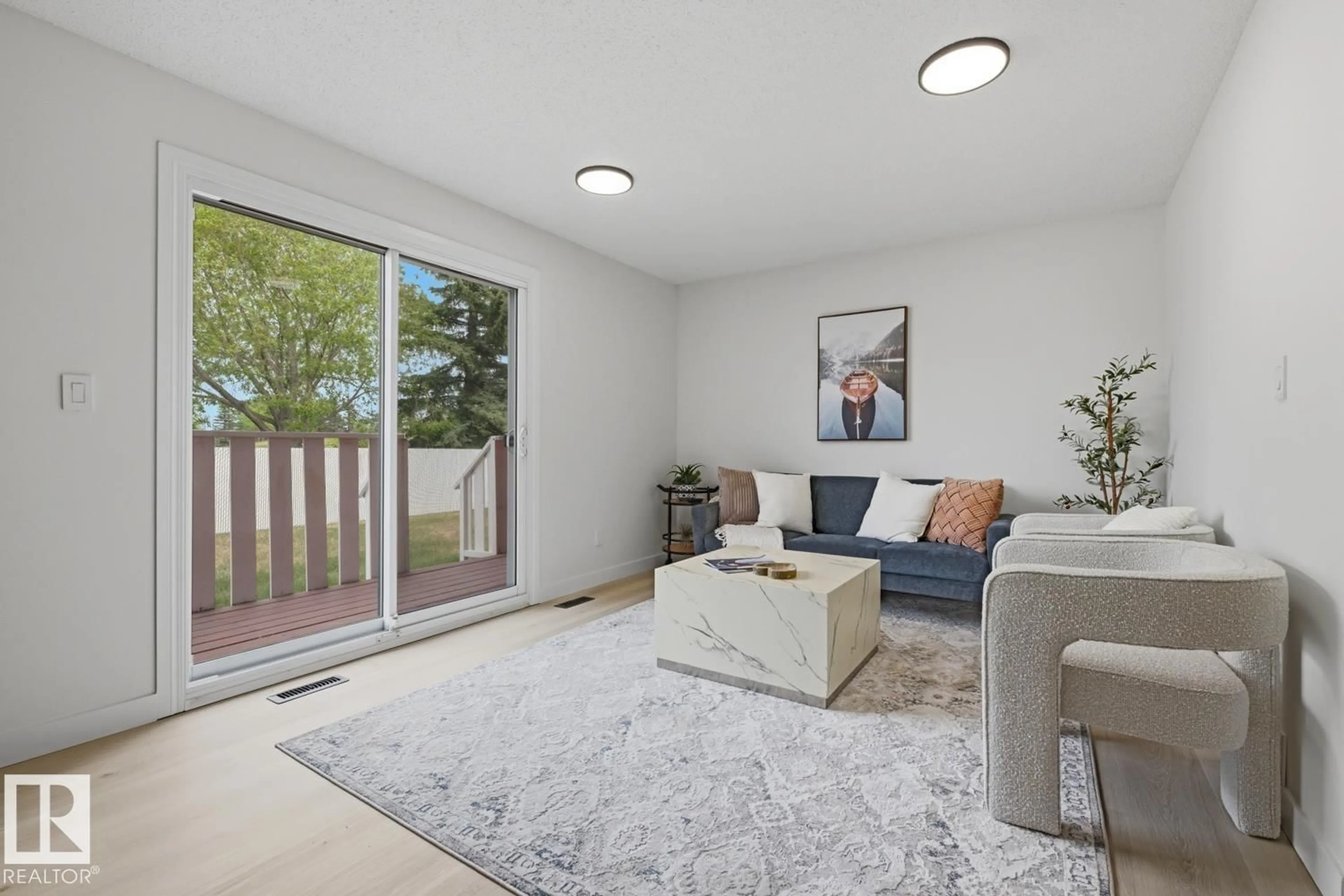Living room with furniture, unknown for 10684 BEAUMARIS RD, Edmonton Alberta T5X3N4
