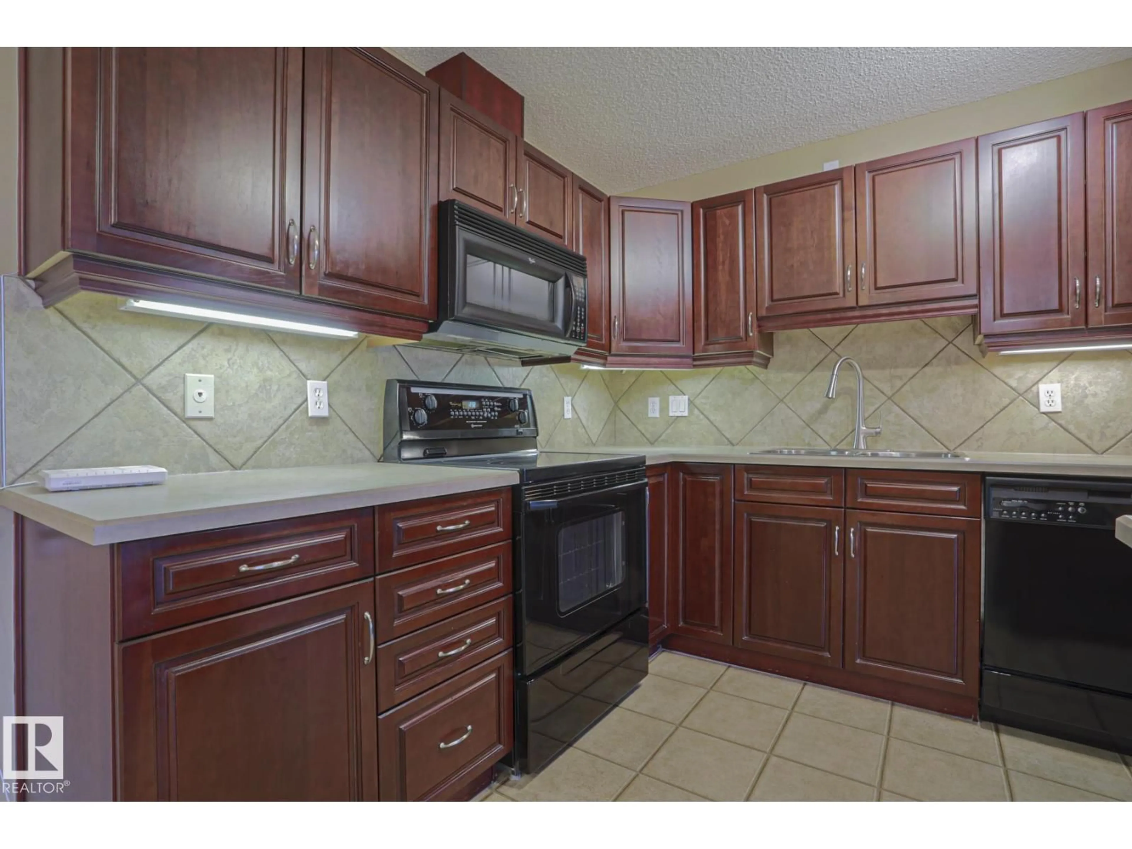 Standard kitchen, ceramic/tile floor for 279 - 216 SUDER GREENS DR, Edmonton Alberta T5T6X6
