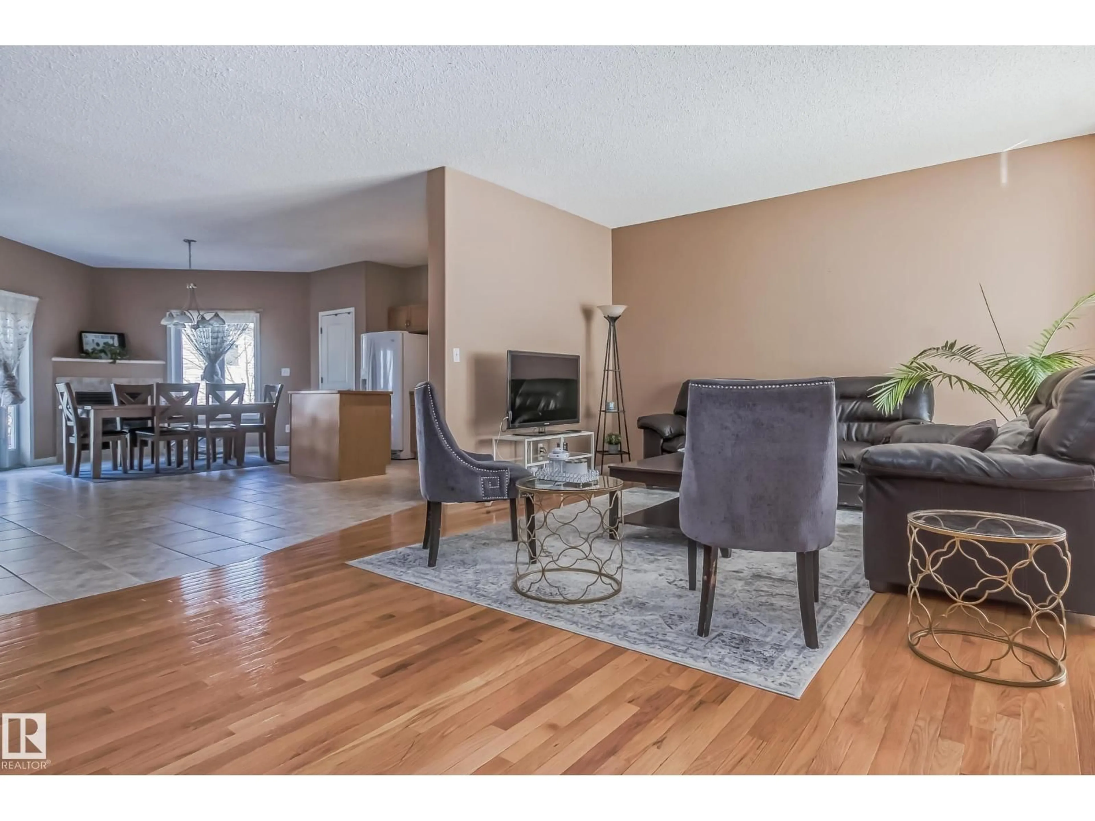 Living room with furniture, wood/laminate floor for #49 - 8403 164 AV, Edmonton Alberta T5Z3Y2