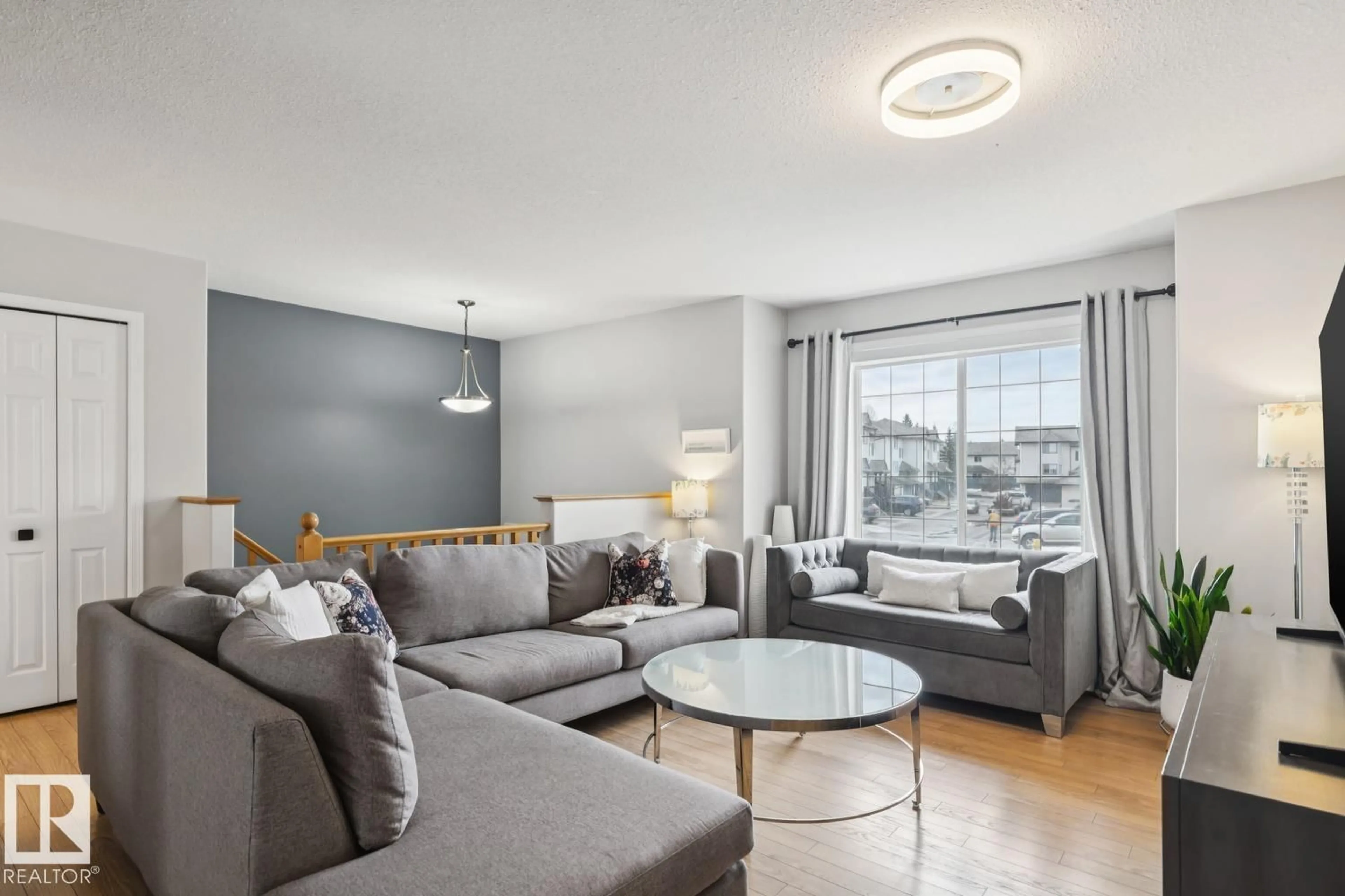 Living room with furniture, unknown for 225 BLACKBURN DR, Edmonton Alberta T6W1H1
