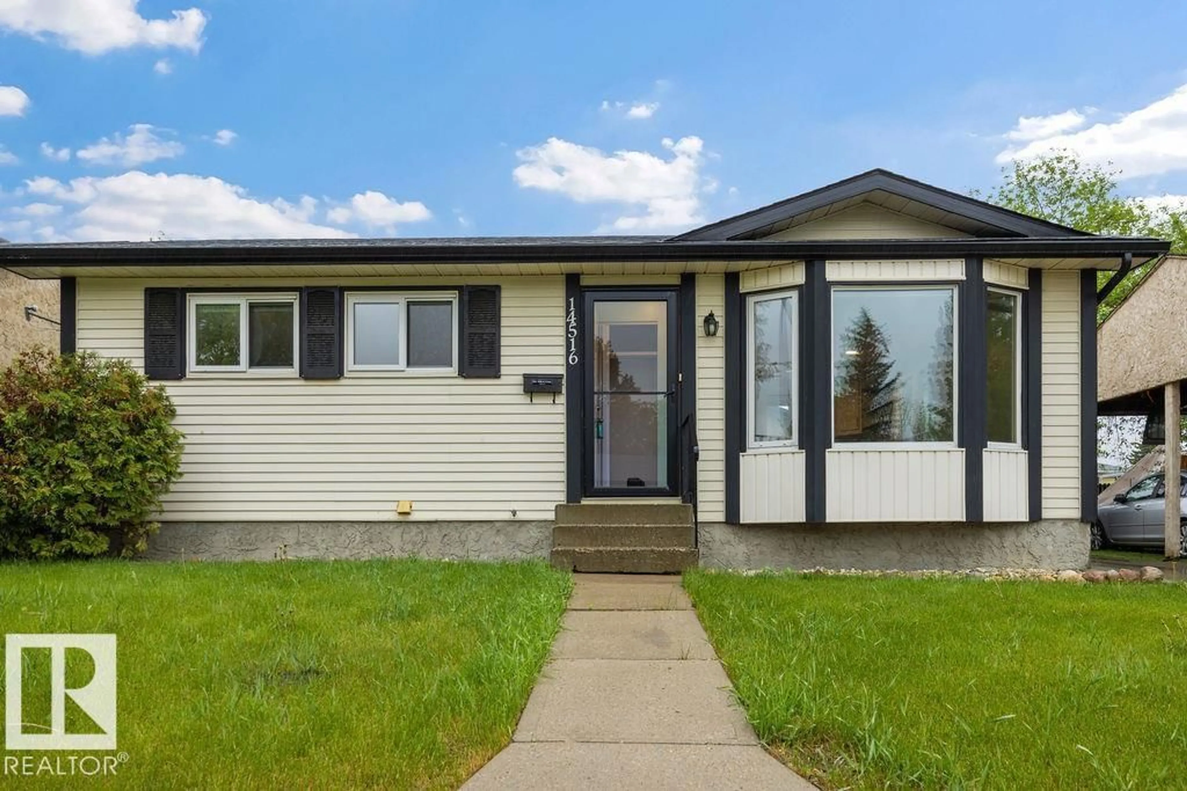 Home with vinyl exterior material, street for 14516 20 ST, Edmonton Alberta T5Y1V7