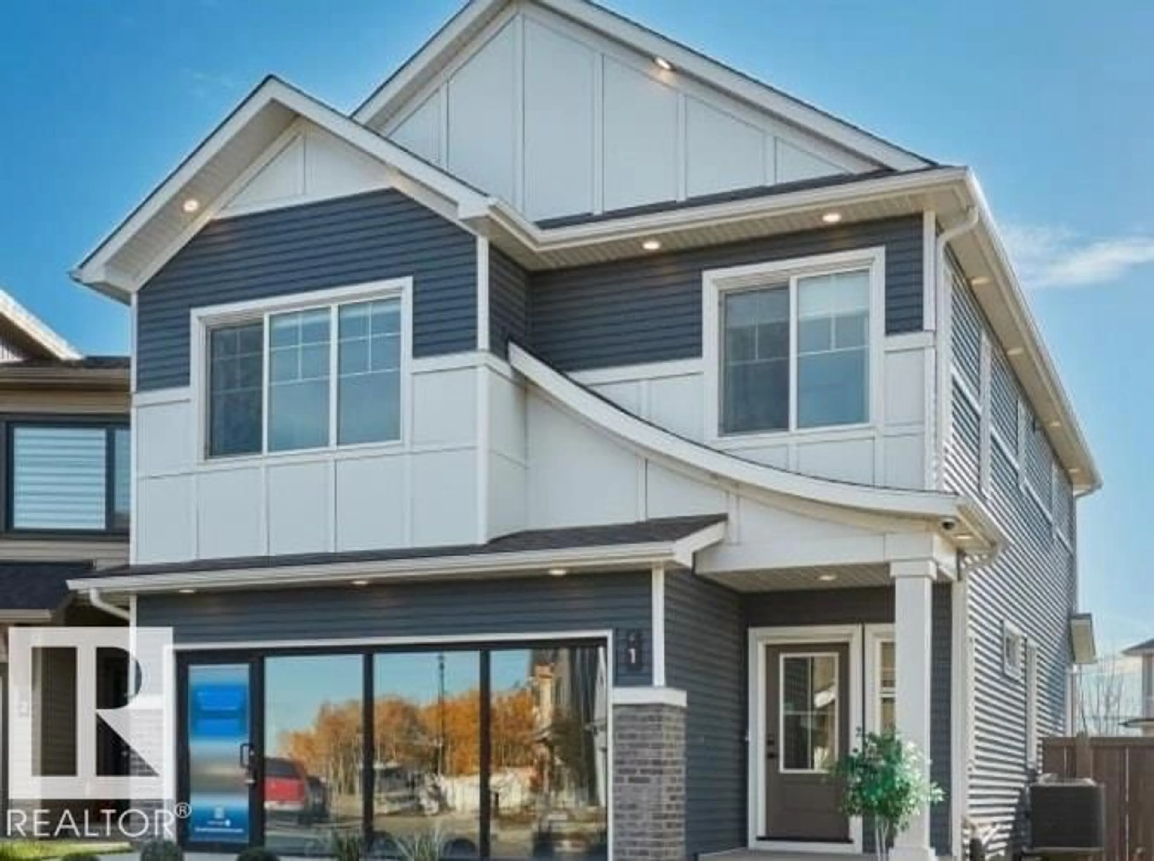Home with vinyl exterior material, street for 19904 31 AV, Edmonton Alberta T6M1N7