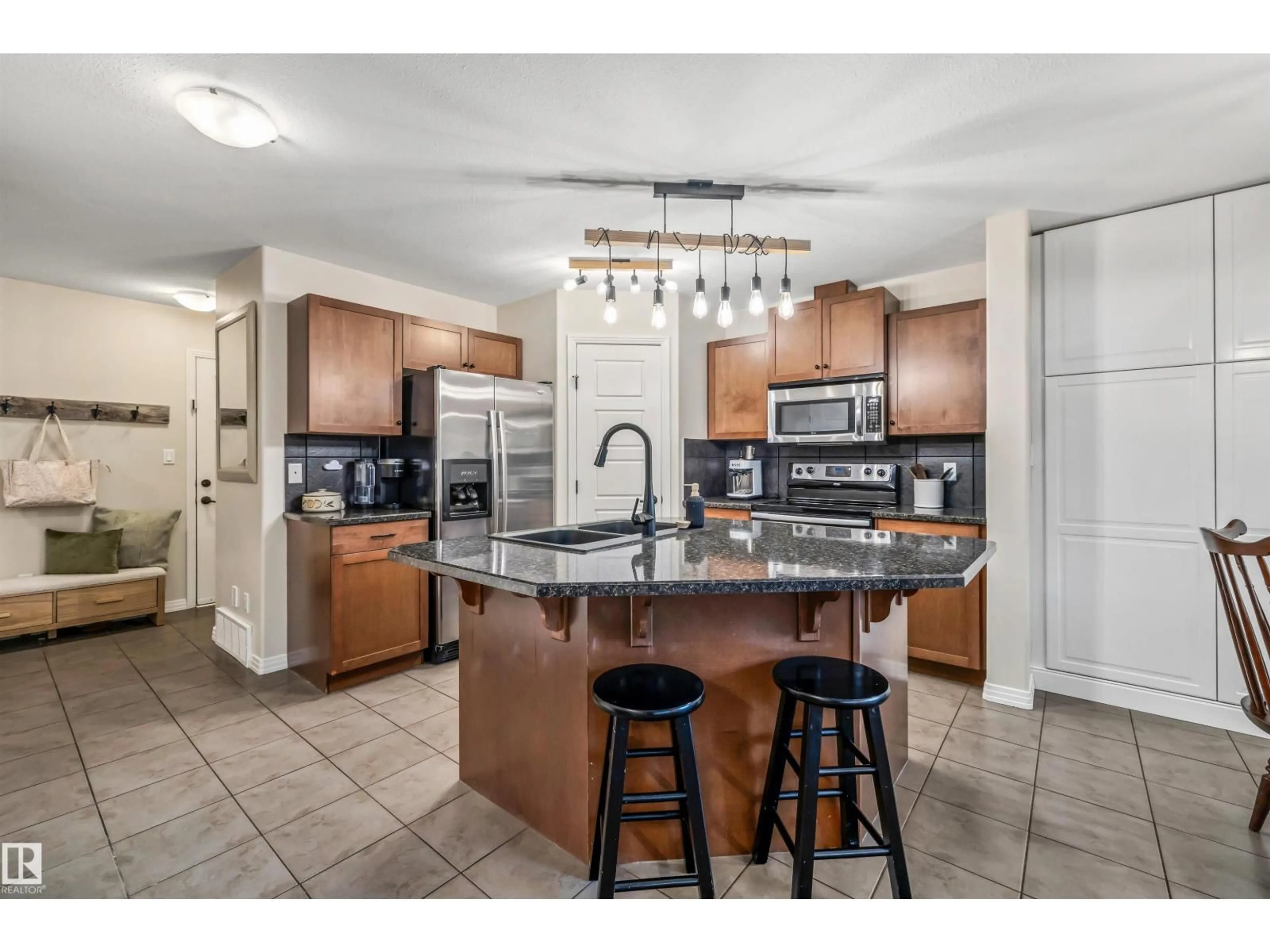 Open concept kitchen, ceramic/tile floor for 78 RED CANYON WY, Fort Saskatchewan Alberta T8L0E7