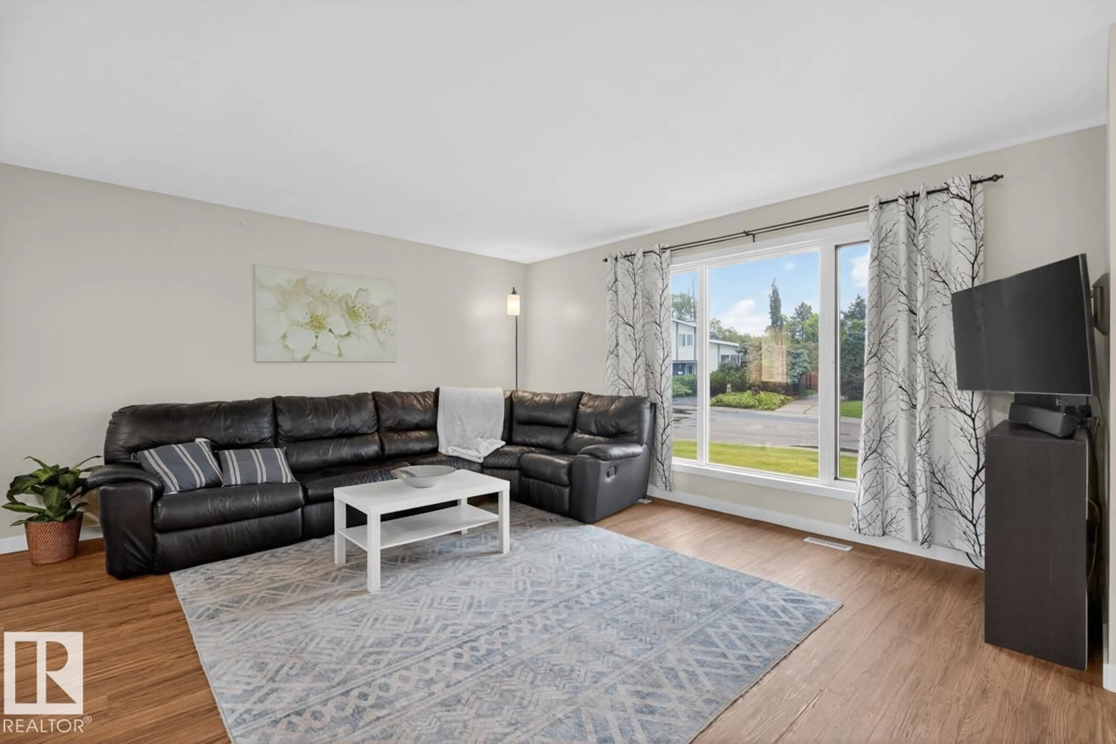 Living room with furniture, unknown for 3437 136A AV, Edmonton Alberta T5A2W5