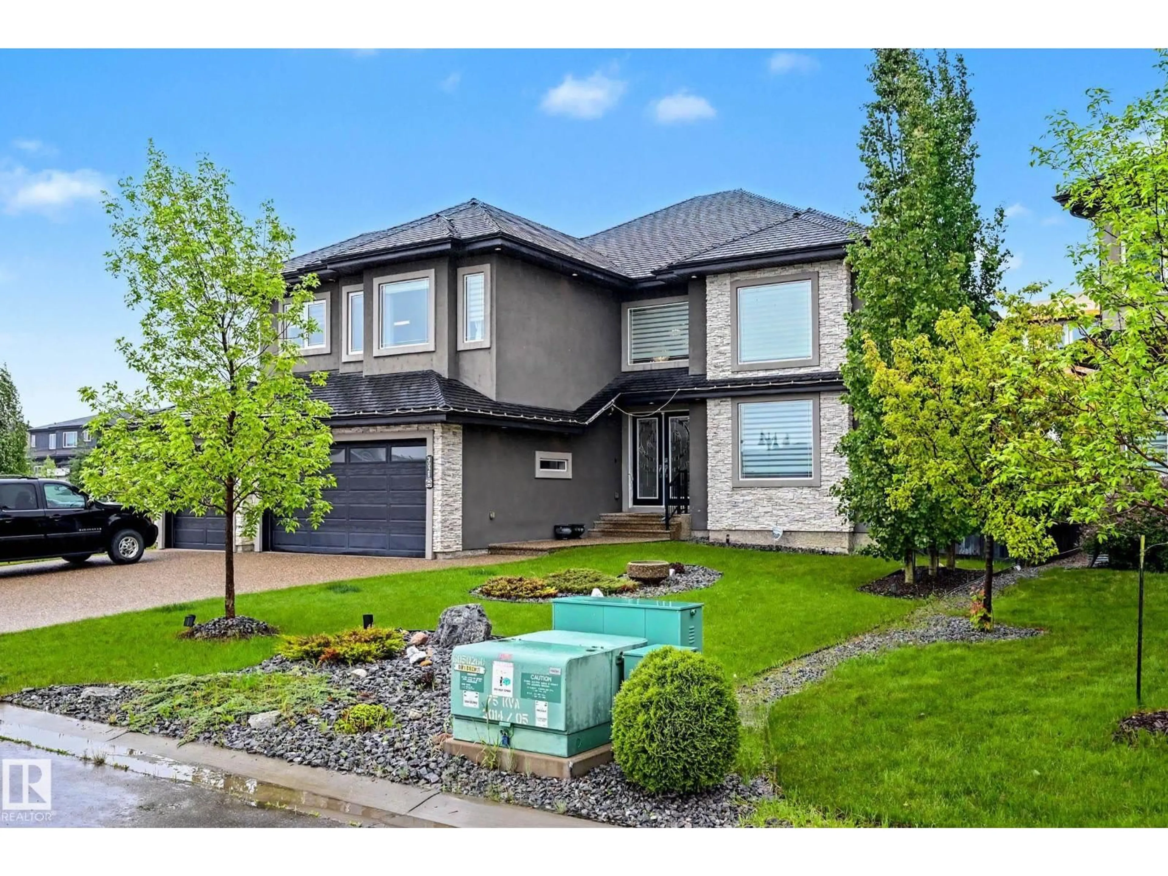 Home with brick exterior material, street for 3028 59 AV, Rural Leduc County Alberta T4X0X9