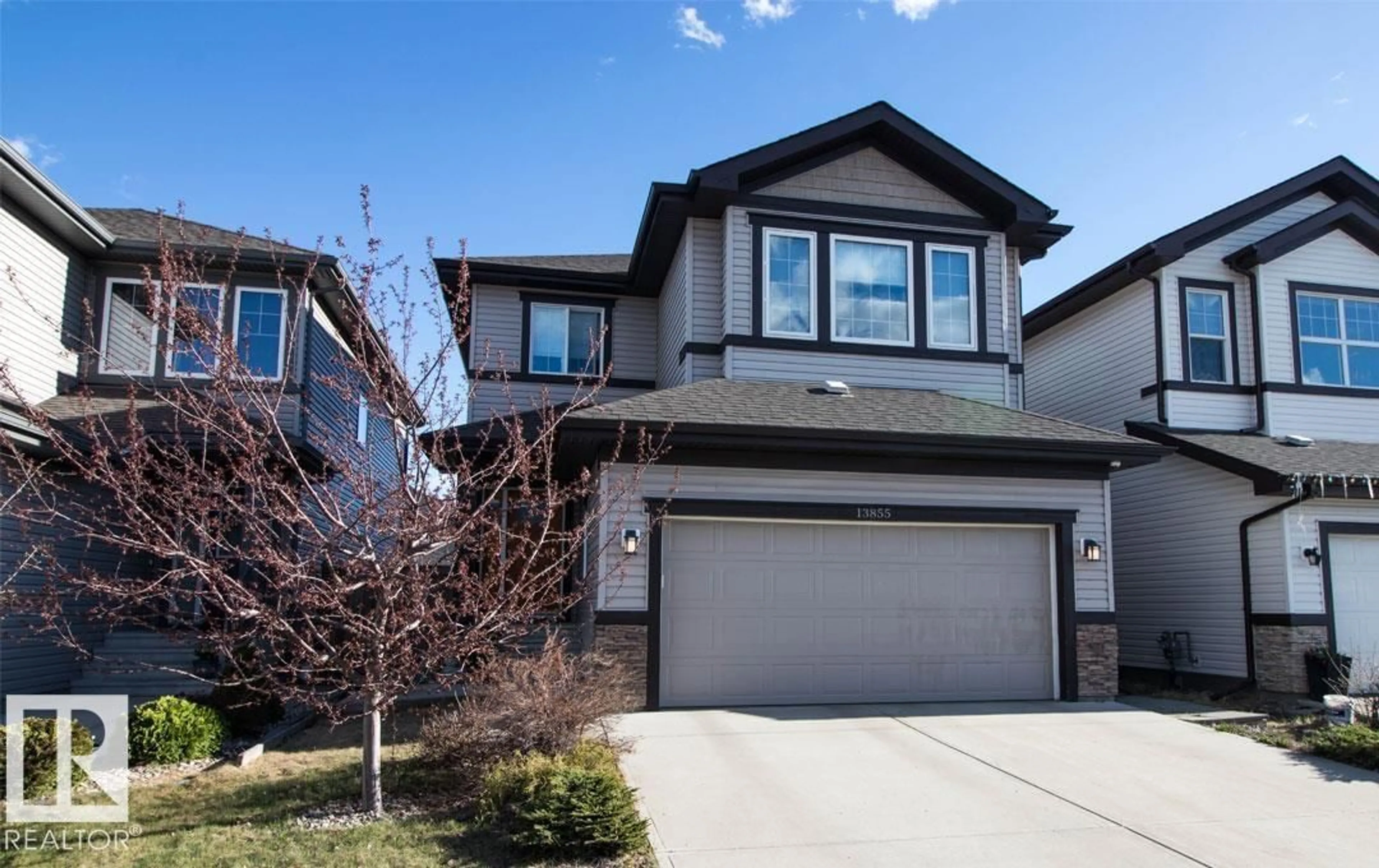 Home with vinyl exterior material, street for 13855 143 AV, Edmonton Alberta T6V0L7
