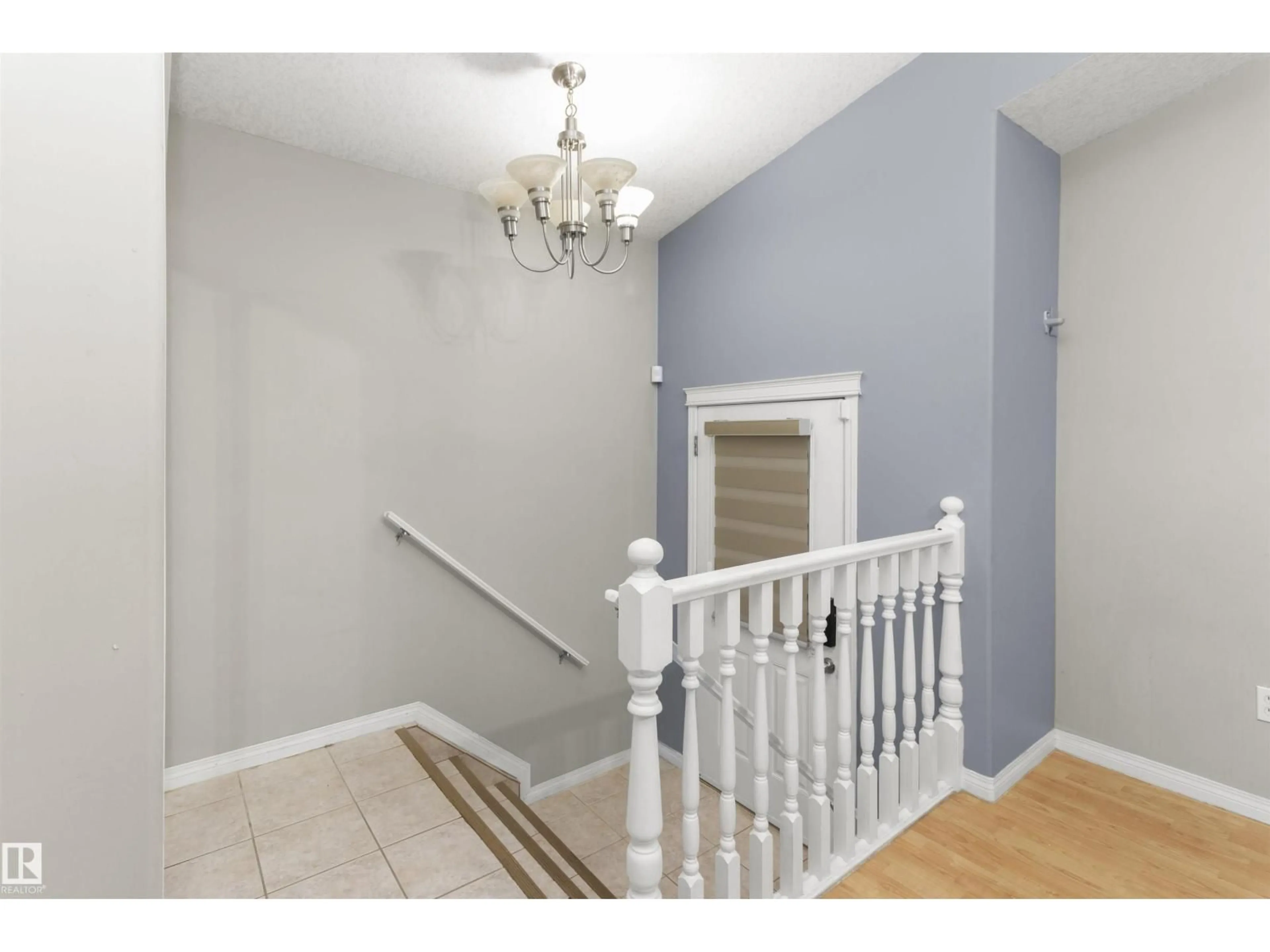 Indoor entryway for 11517 83 ST, Edmonton Alberta T5B2Y6