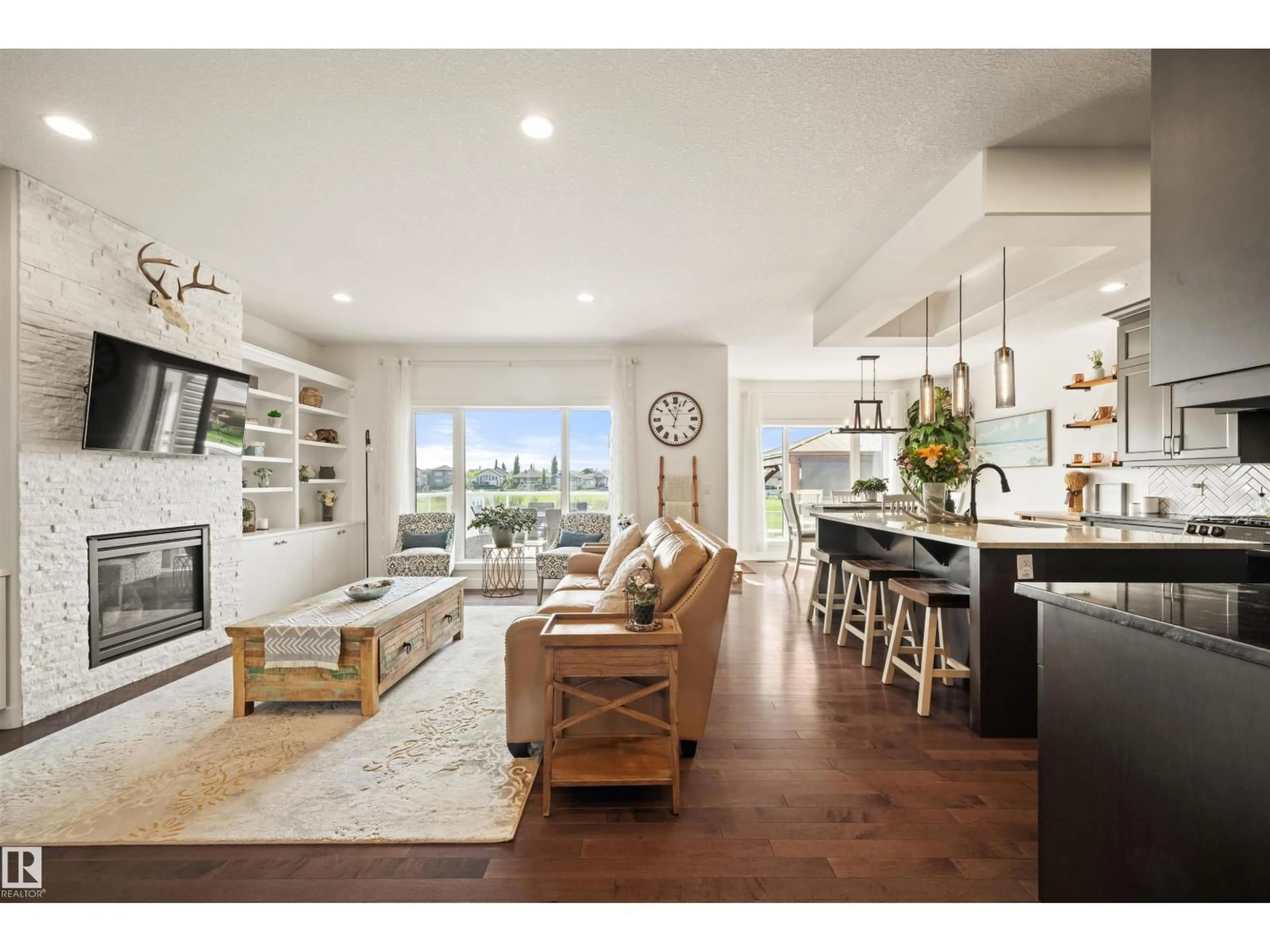 Open concept kitchen, wood/laminate floor for 9629 106 AV, Morinville Alberta T8R0E8