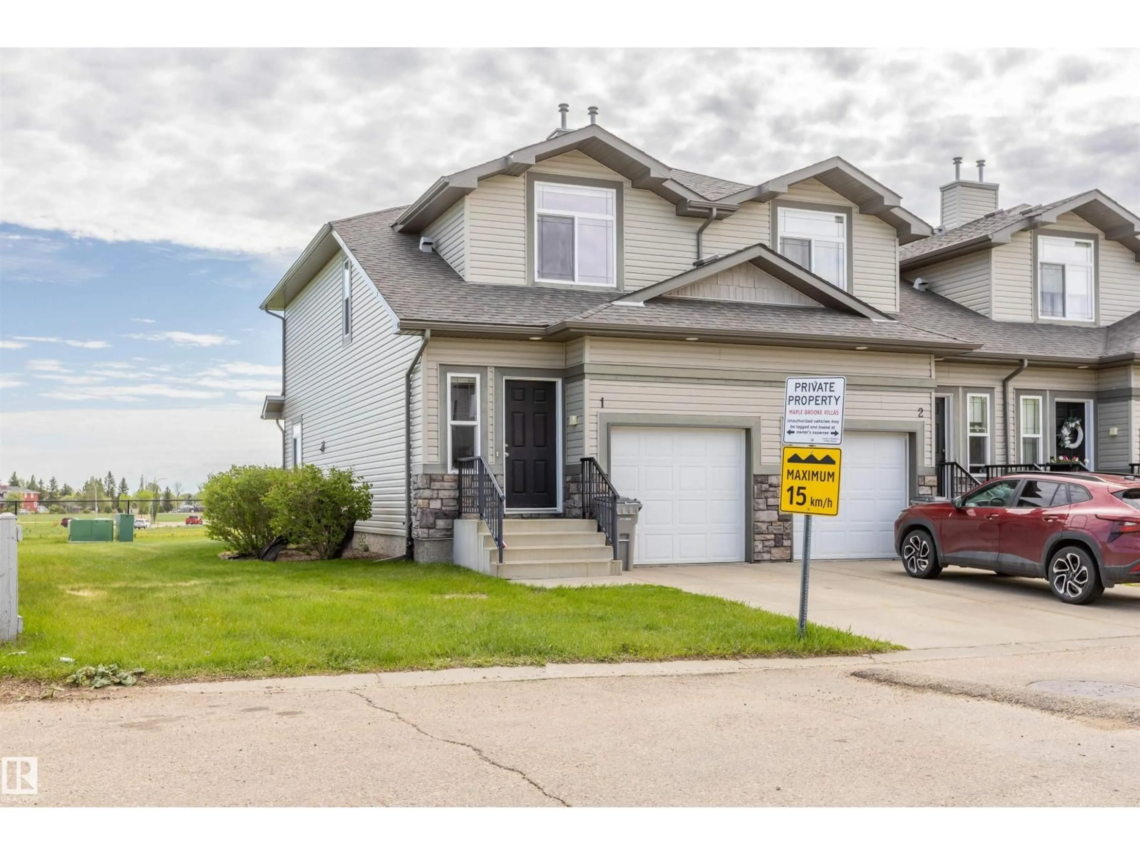 Home with vinyl exterior material, street for 9511 102 AV, Morinville Alberta T8R0C6