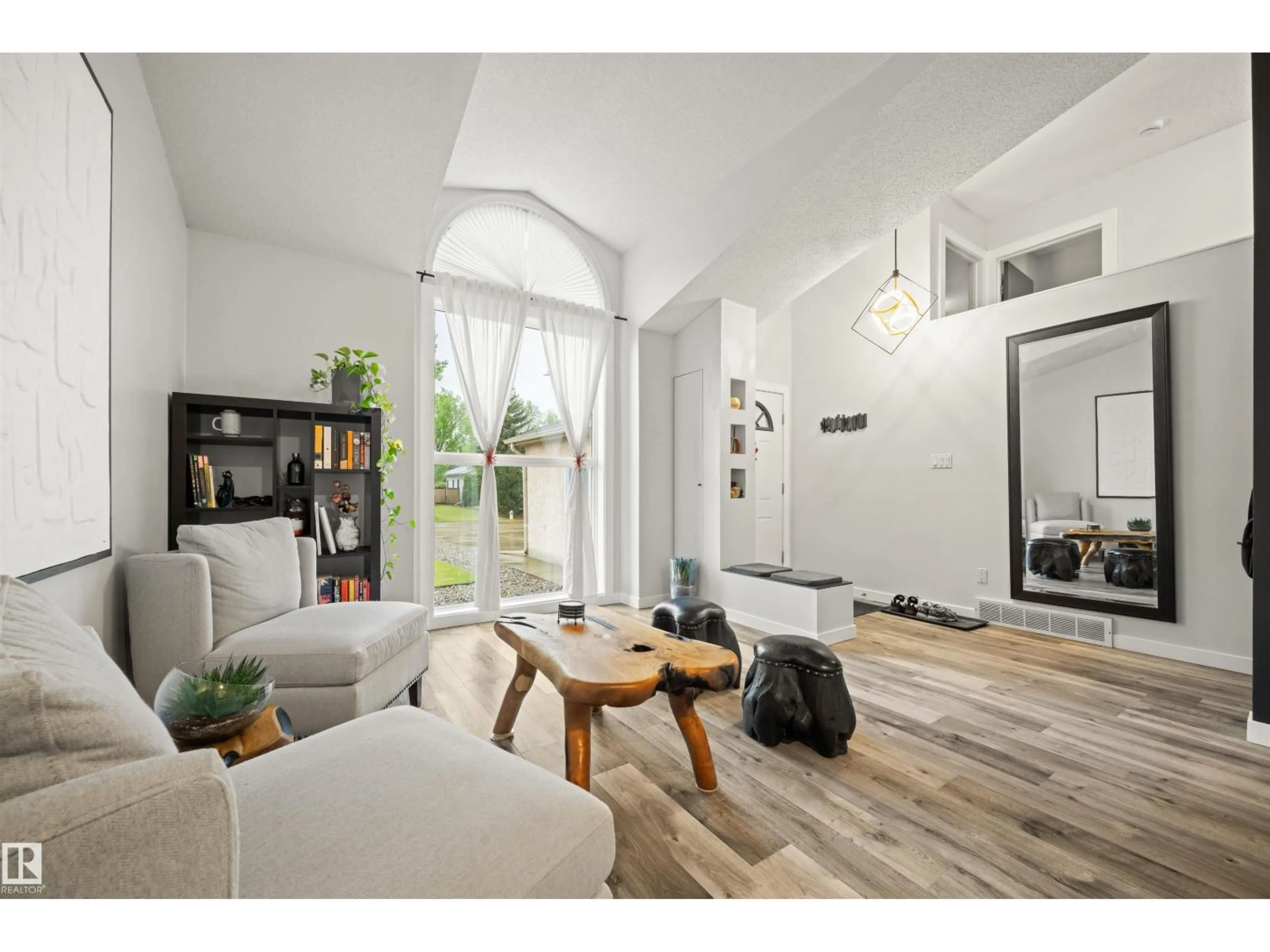 Living room with furniture, wood/laminate floor for 315 BUCHANAN WY, Edmonton Alberta T6R2B4