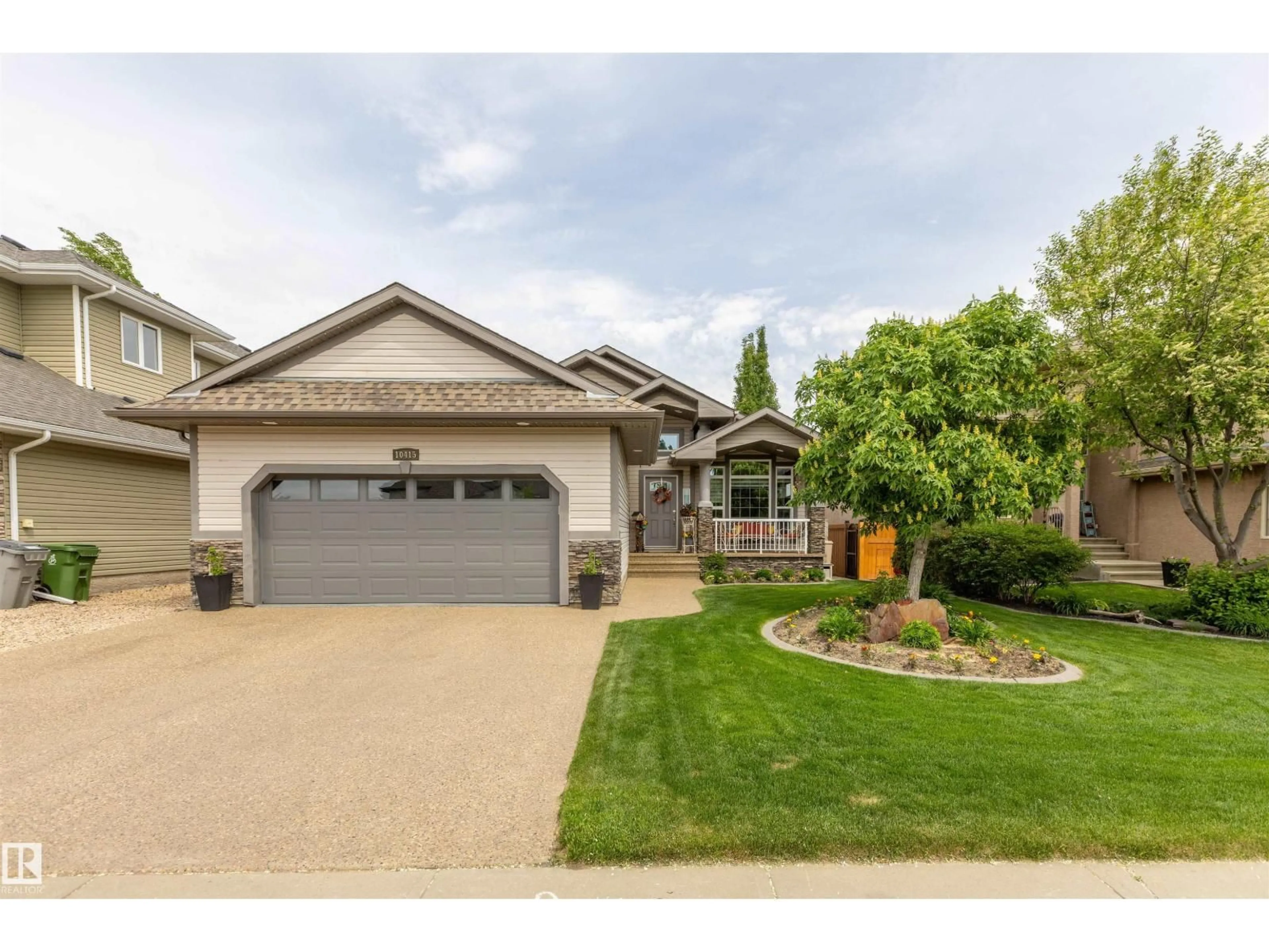 Home with vinyl exterior material, street for 10415 97 ST, Morinville Alberta T8R0B8