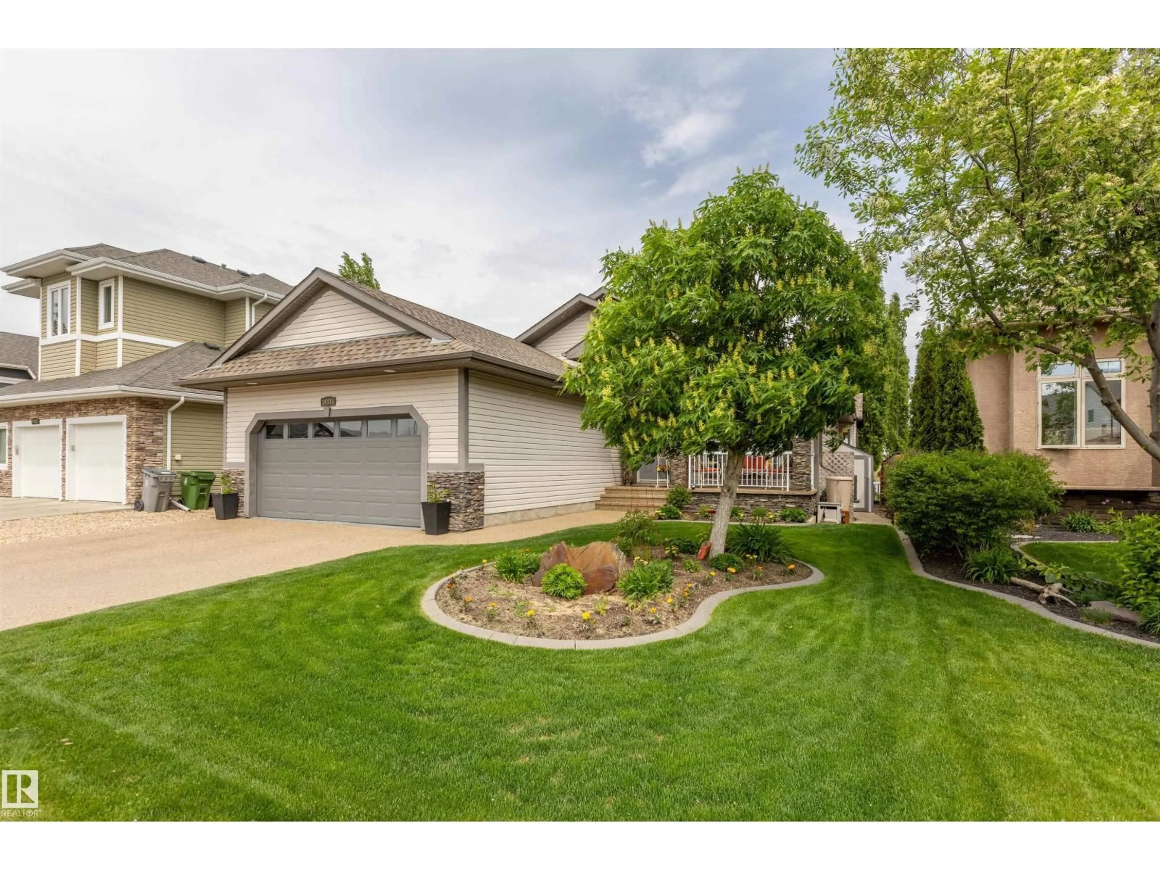 A pic from outside/outdoor area/front of a property/back of a property/a pic from drone, street for 10415 97 ST, Morinville Alberta T8R0B8