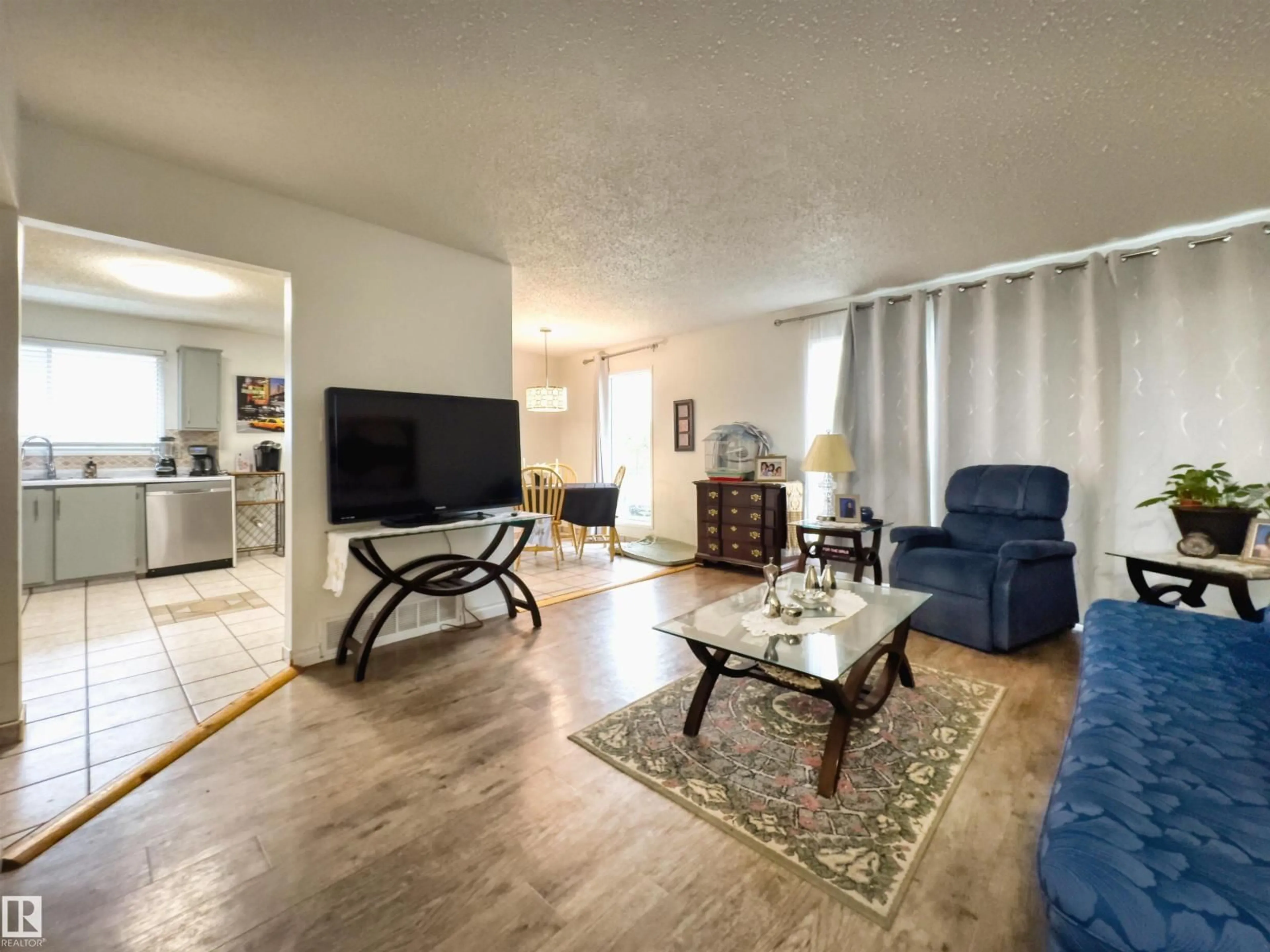 Living room with furniture, wood/laminate floor for 4721 45 ST, Gibbons Alberta T0A1N0
