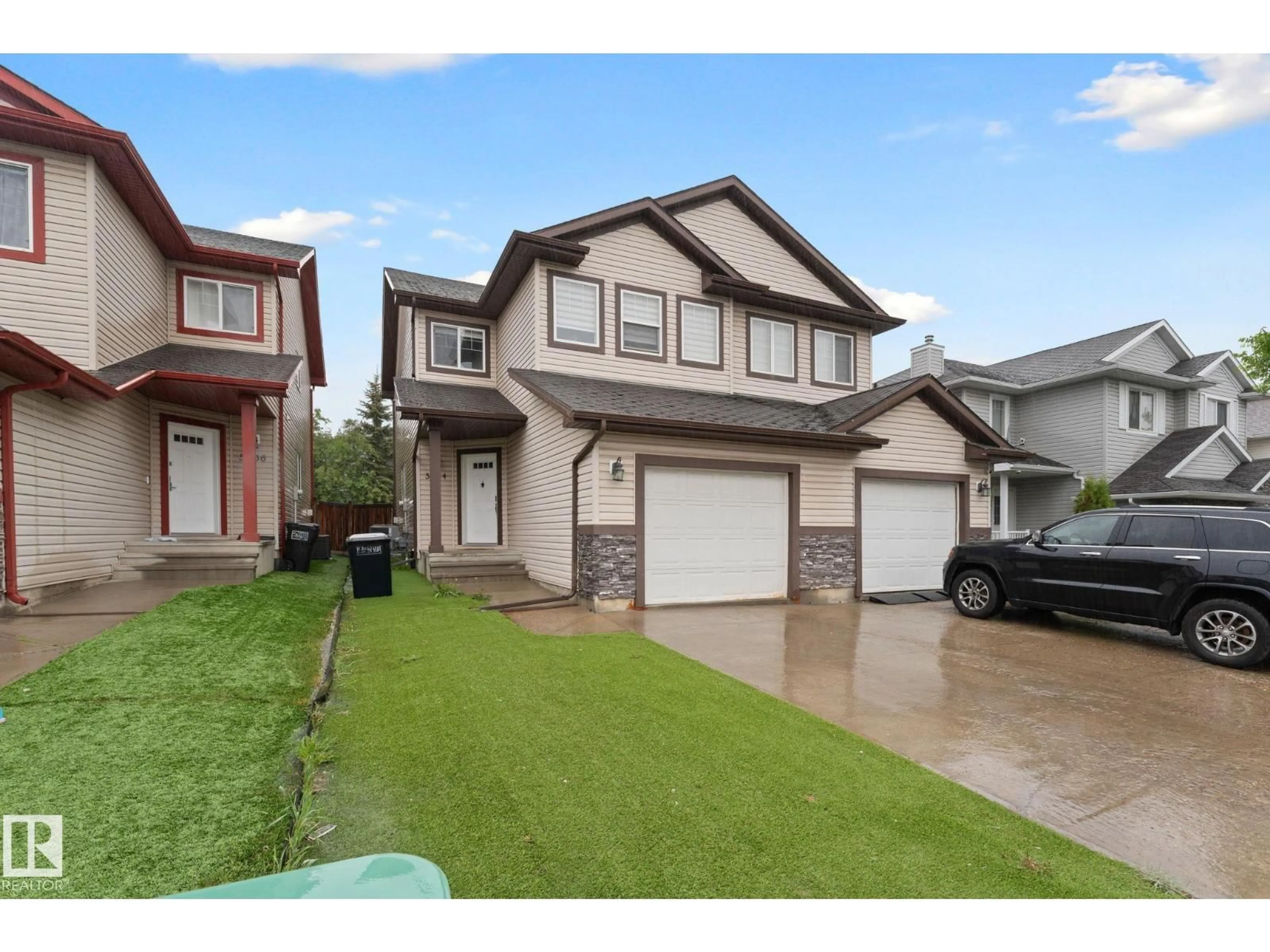 Home with vinyl exterior material, street for 5964 164 AV, Edmonton Alberta T5Y0B2