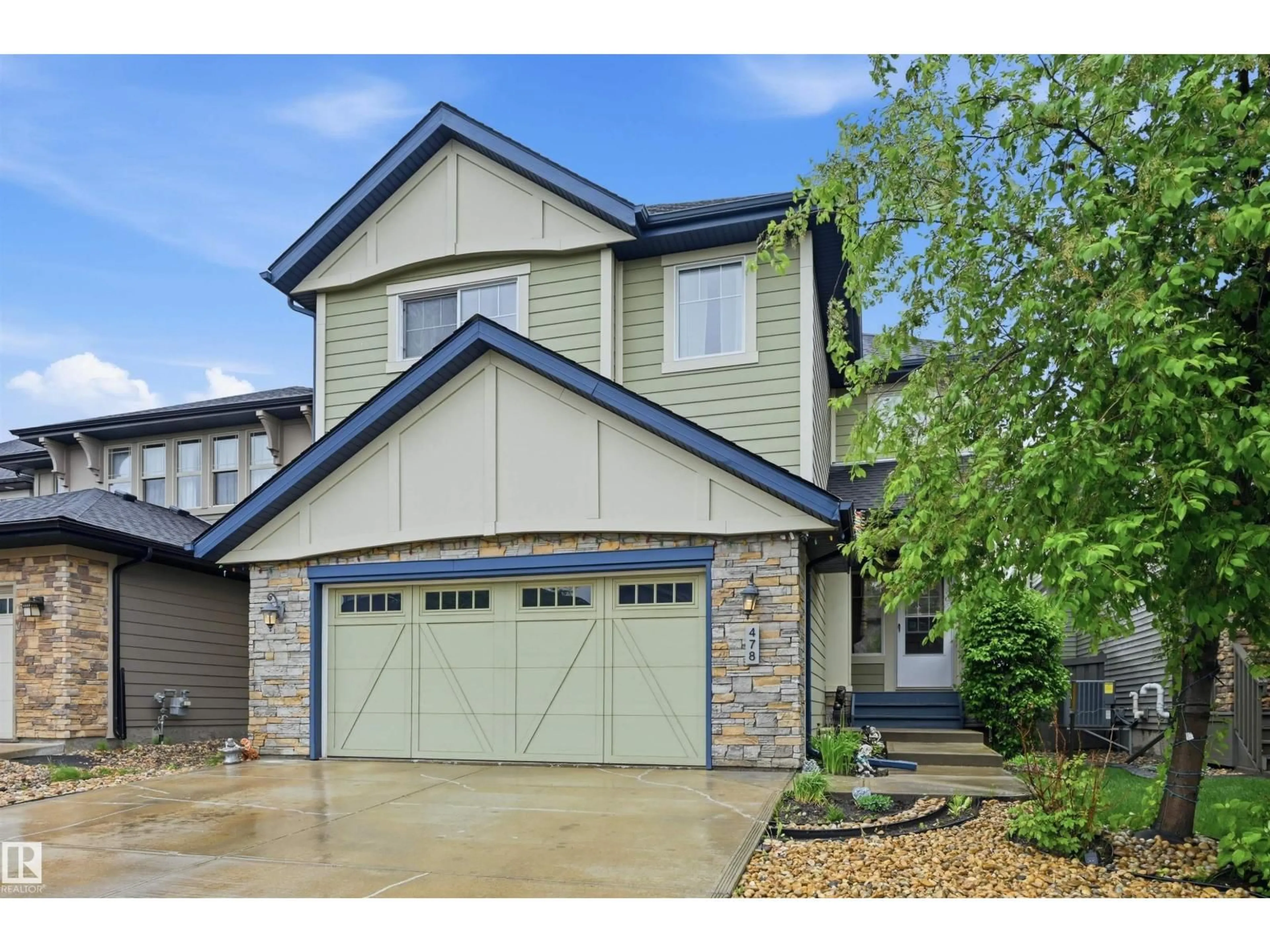 Home with vinyl exterior material, street for 478 AINSLIE CR, Edmonton Alberta T6W0H7
