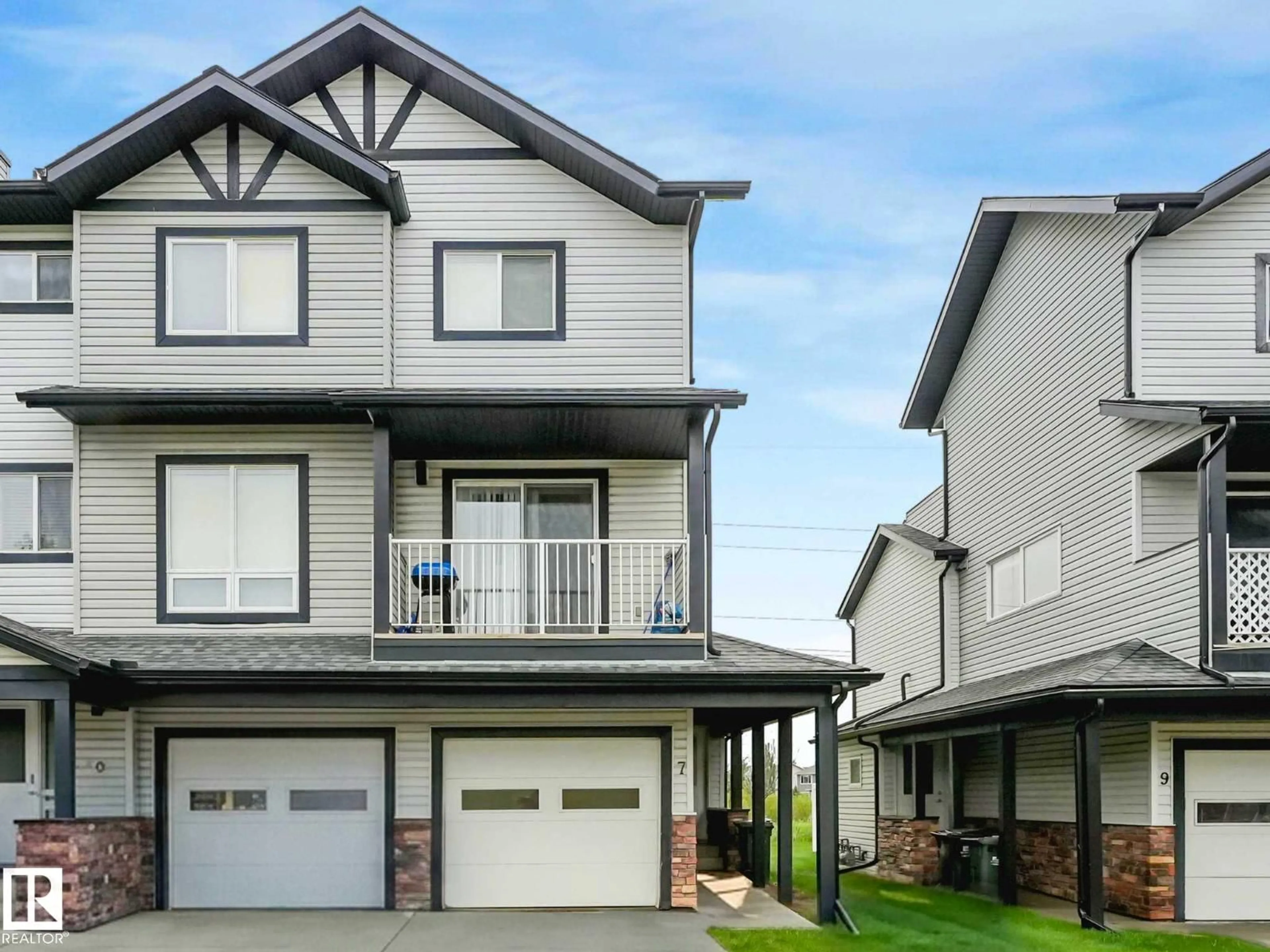 Home with vinyl exterior material, street for 11 - 7 CLOVER BAR LN, Sherwood Park Alberta T8H0C4