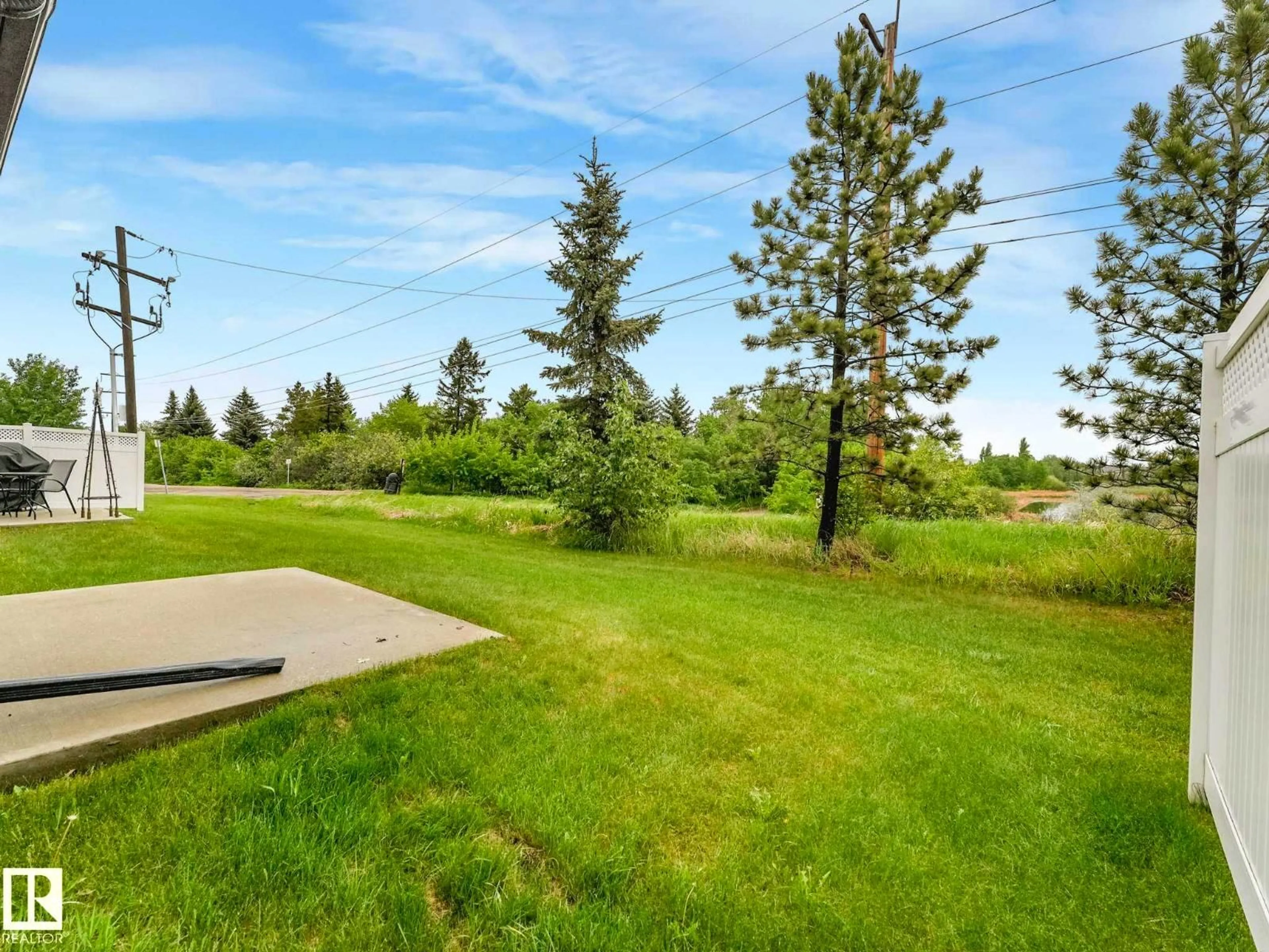 Patio, water/lake/river/ocean view for 11 - 7 CLOVER BAR LN, Sherwood Park Alberta T8H0C4