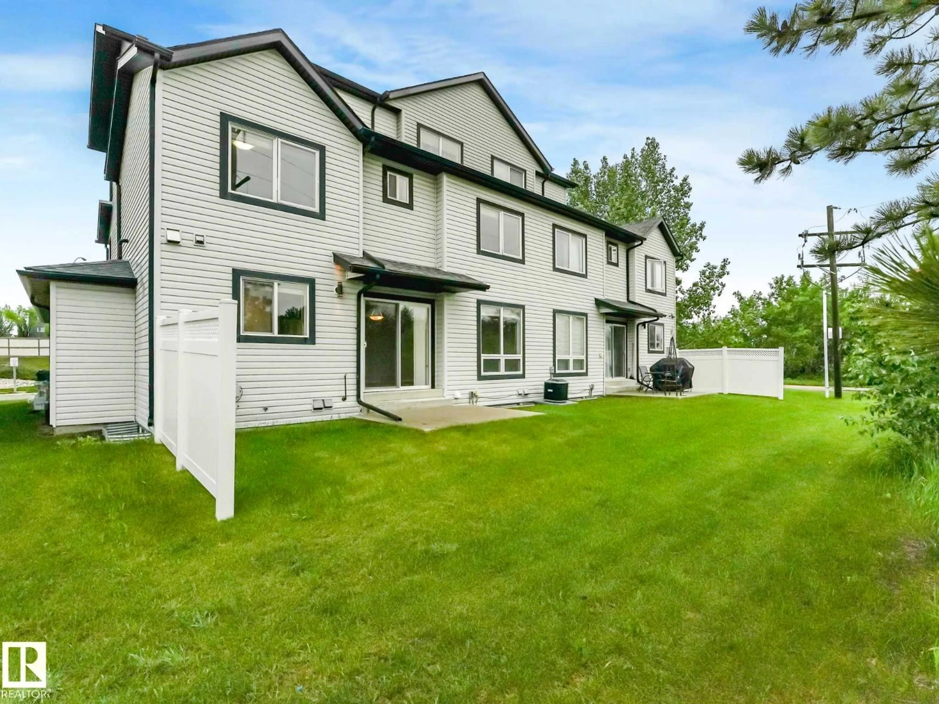 A pic from outside/outdoor area/front of a property/back of a property/a pic from drone, street for 11 - 7 CLOVER BAR LN, Sherwood Park Alberta T8H0C4