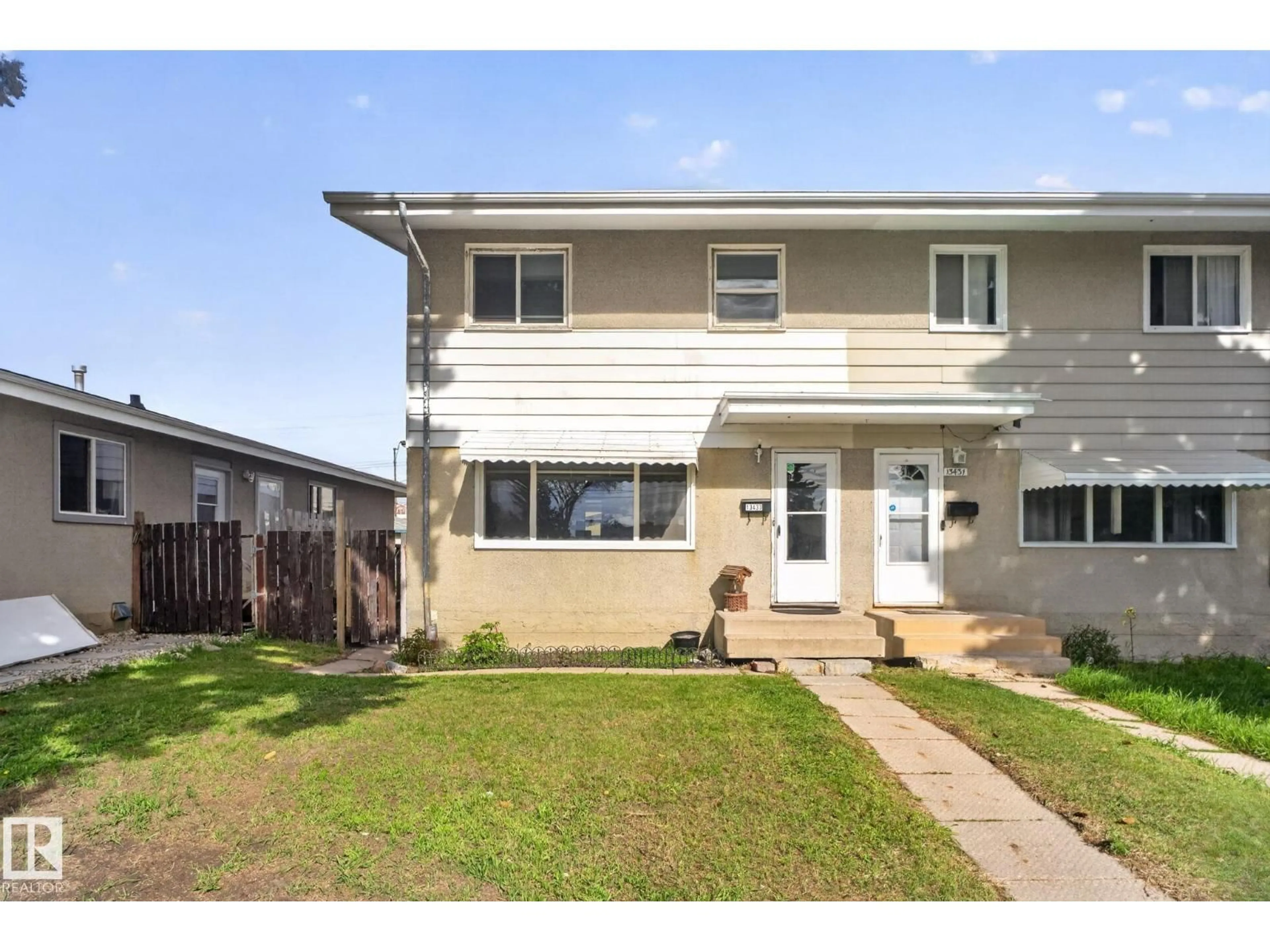 Home with vinyl exterior material, street for 13433 101 ST, Edmonton Alberta T5E4G5