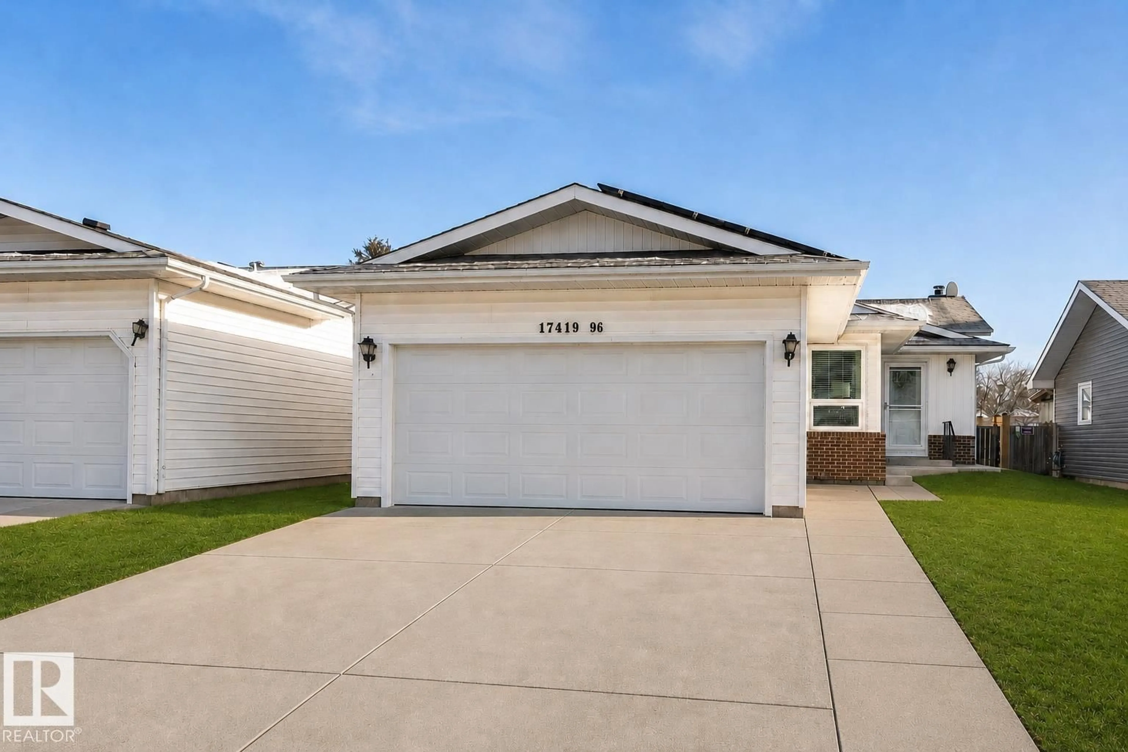 Home with vinyl exterior material, street for 17419 96 ST, Edmonton Alberta T5Z2B5