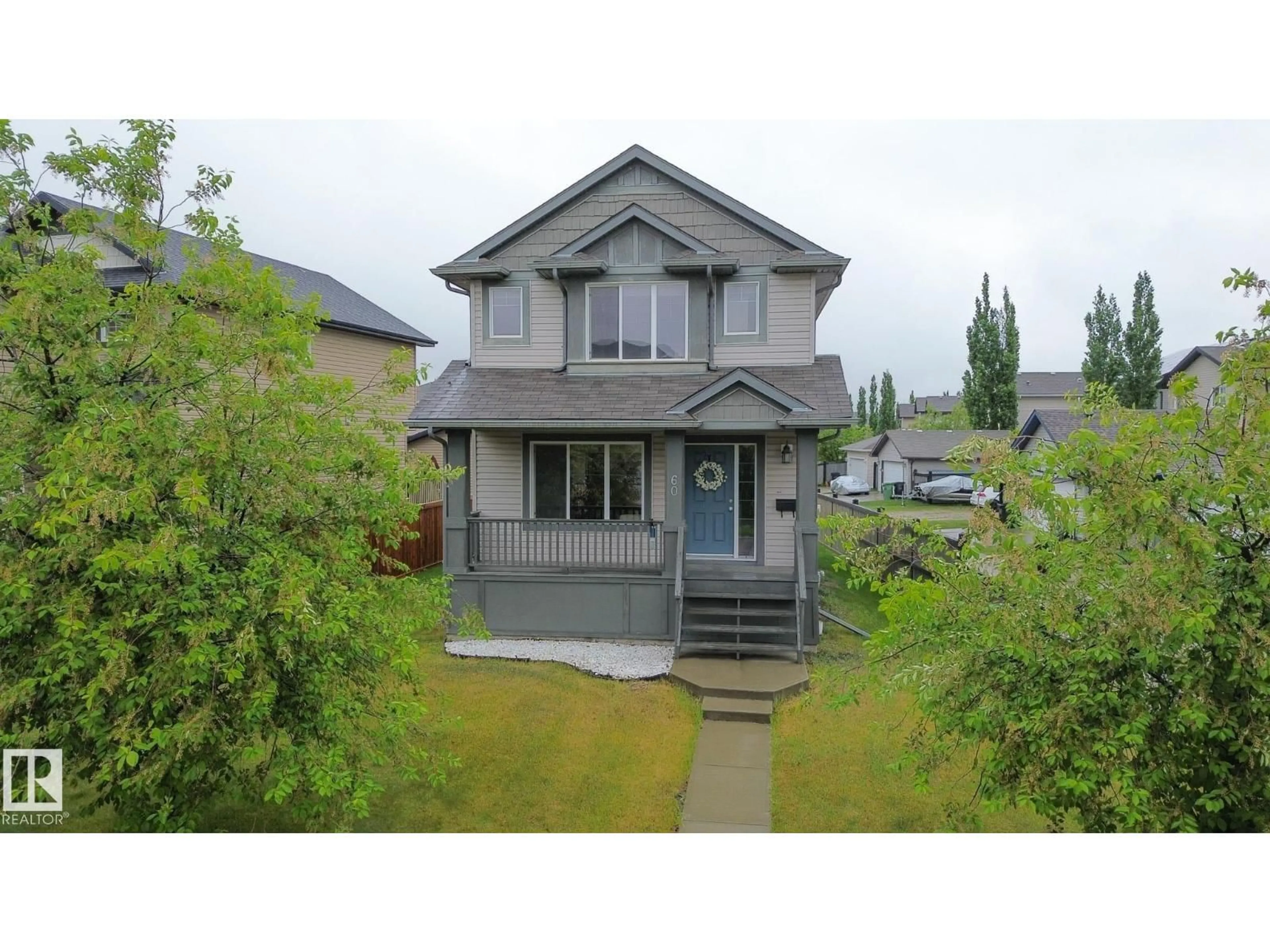 A pic from outside/outdoor area/front of a property/back of a property/a pic from drone, street for 60 KEYSTONE CR, Leduc Alberta T9E0M5