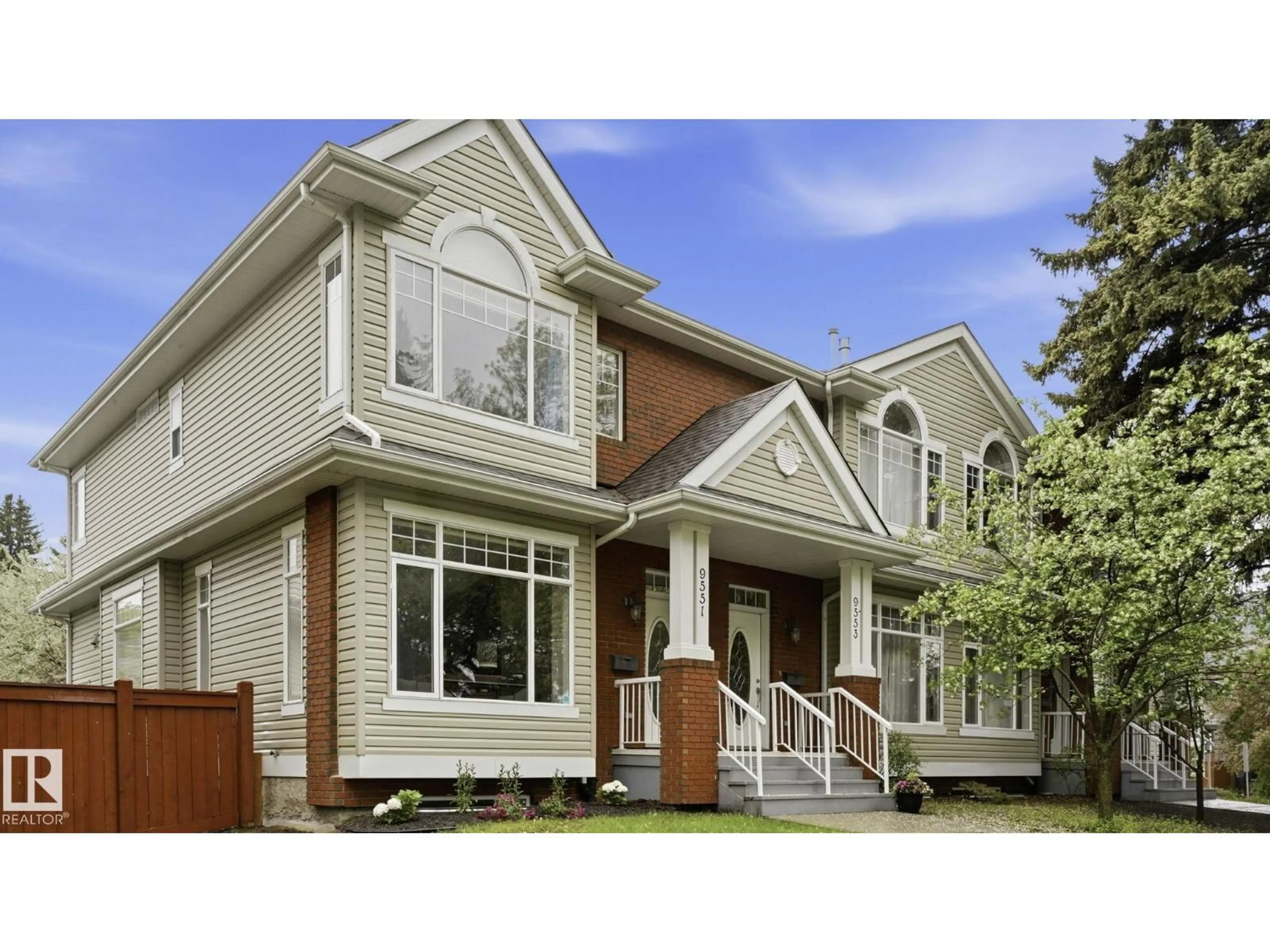 Home with vinyl exterior material, street for NW - 9551 73 AV, Edmonton Alberta T6E1B1