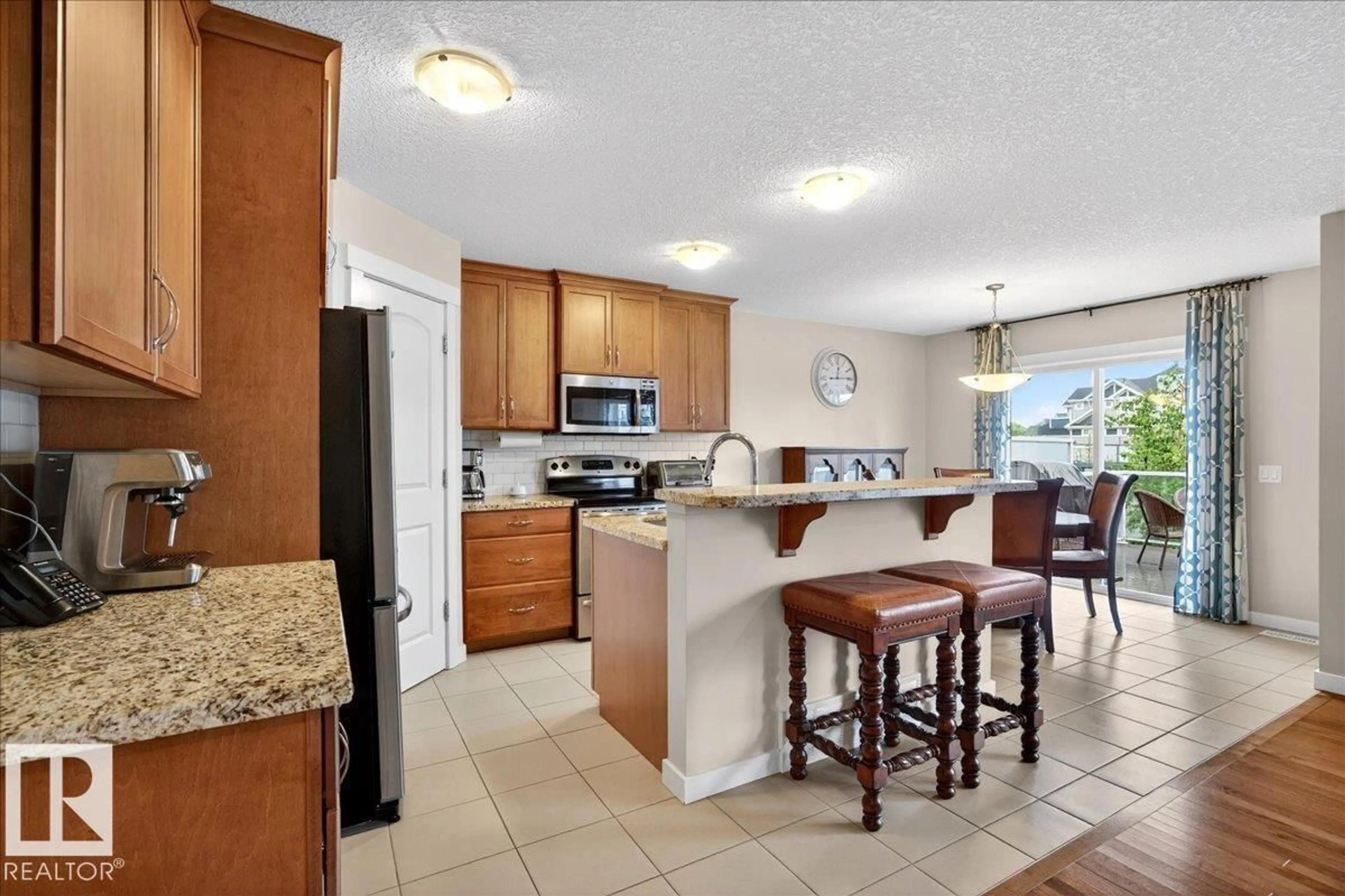 Open concept kitchen, ceramic/tile floor for 1820 86 ST, Edmonton Alberta T6X1J4