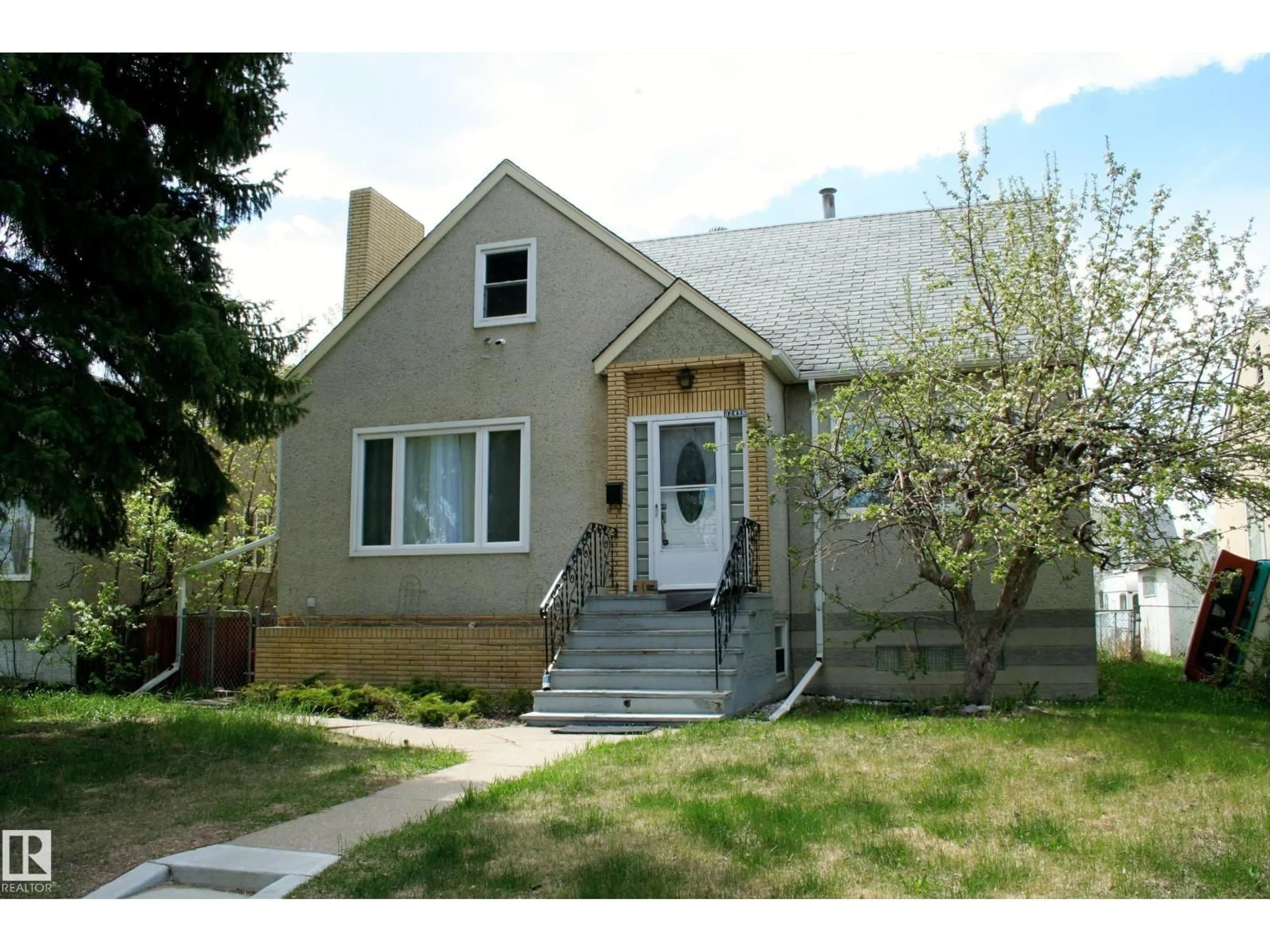 Home with vinyl exterior material, street for NW - 12436 75 ST, Edmonton Alberta T5B2C2