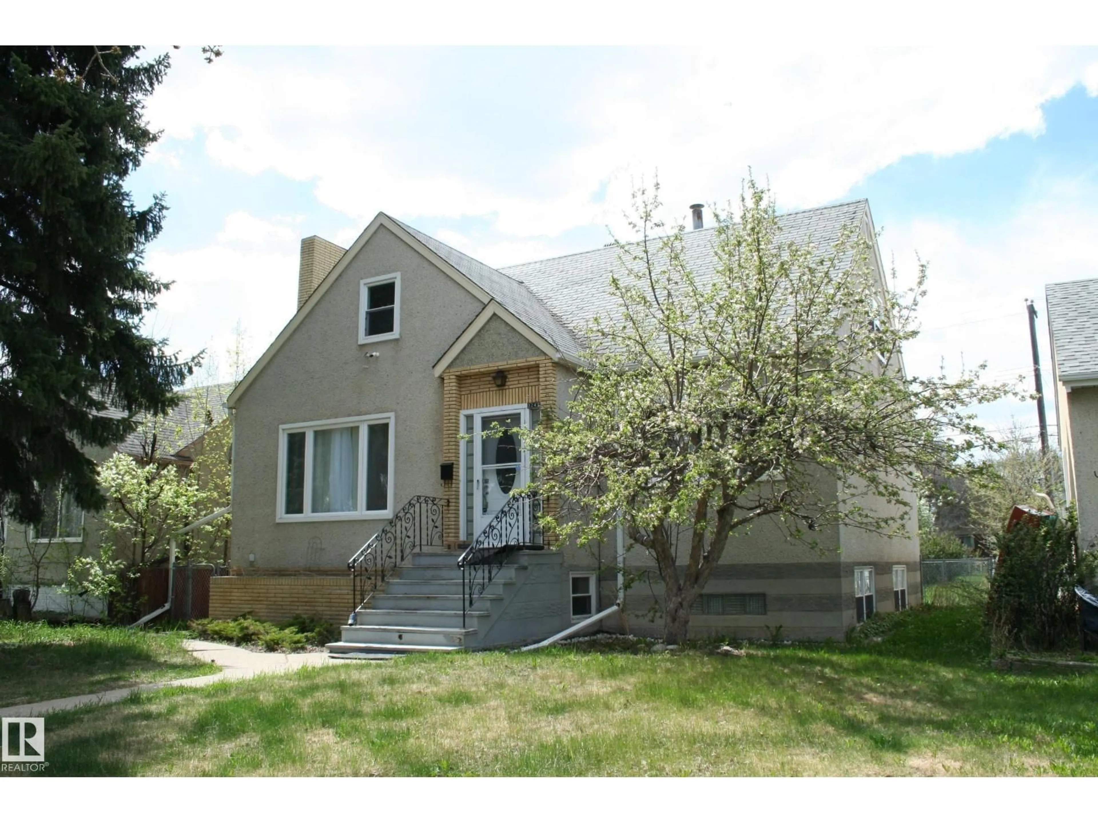 Home with vinyl exterior material, street for NW - 12436 75 ST, Edmonton Alberta T5B2C2