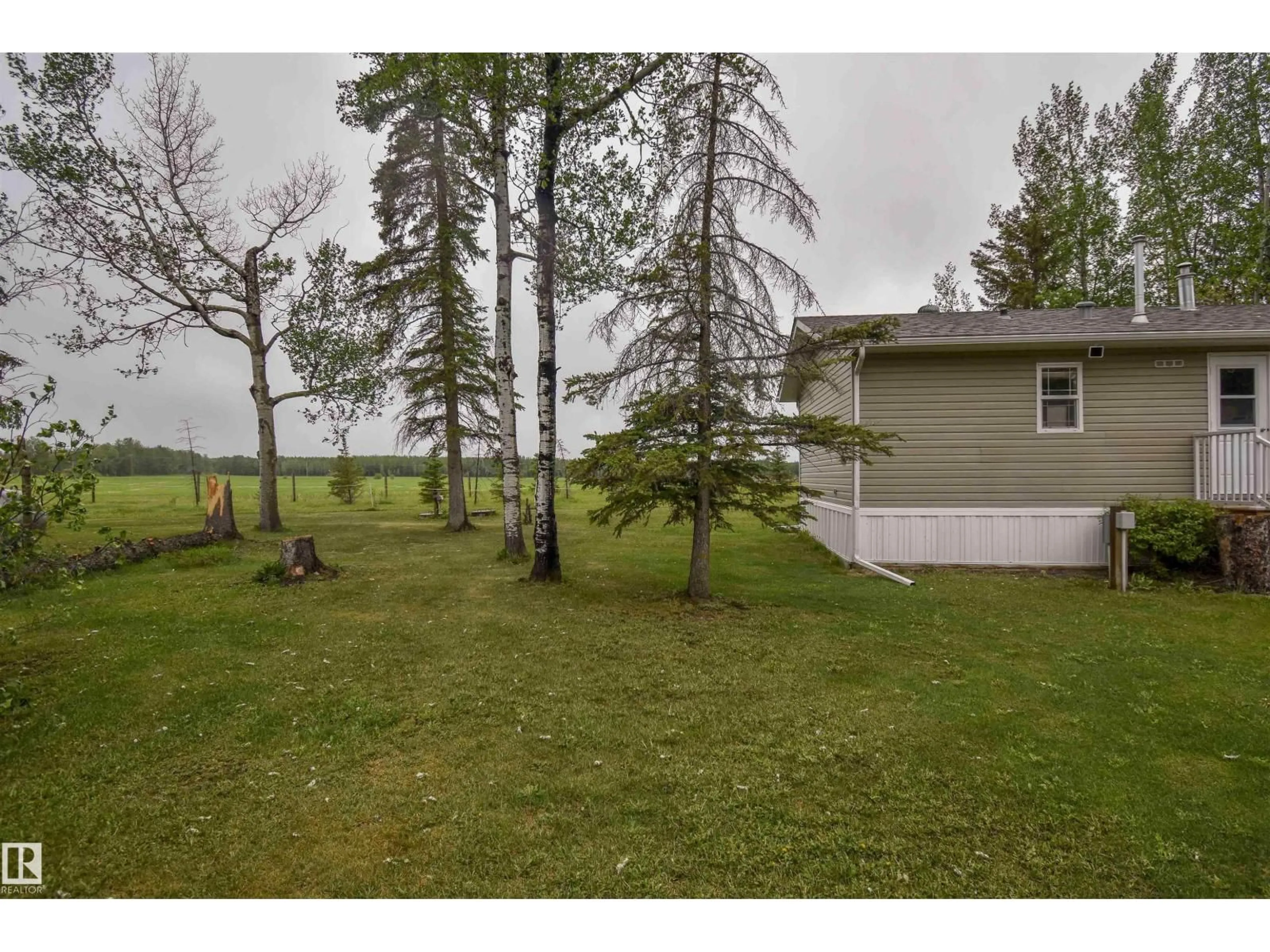 A pic from outside/outdoor area/front of a property/back of a property/a pic from drone, forest/trees view for 50120 RANGE ROAD 80, Rural Brazeau County Alberta T7A1S6