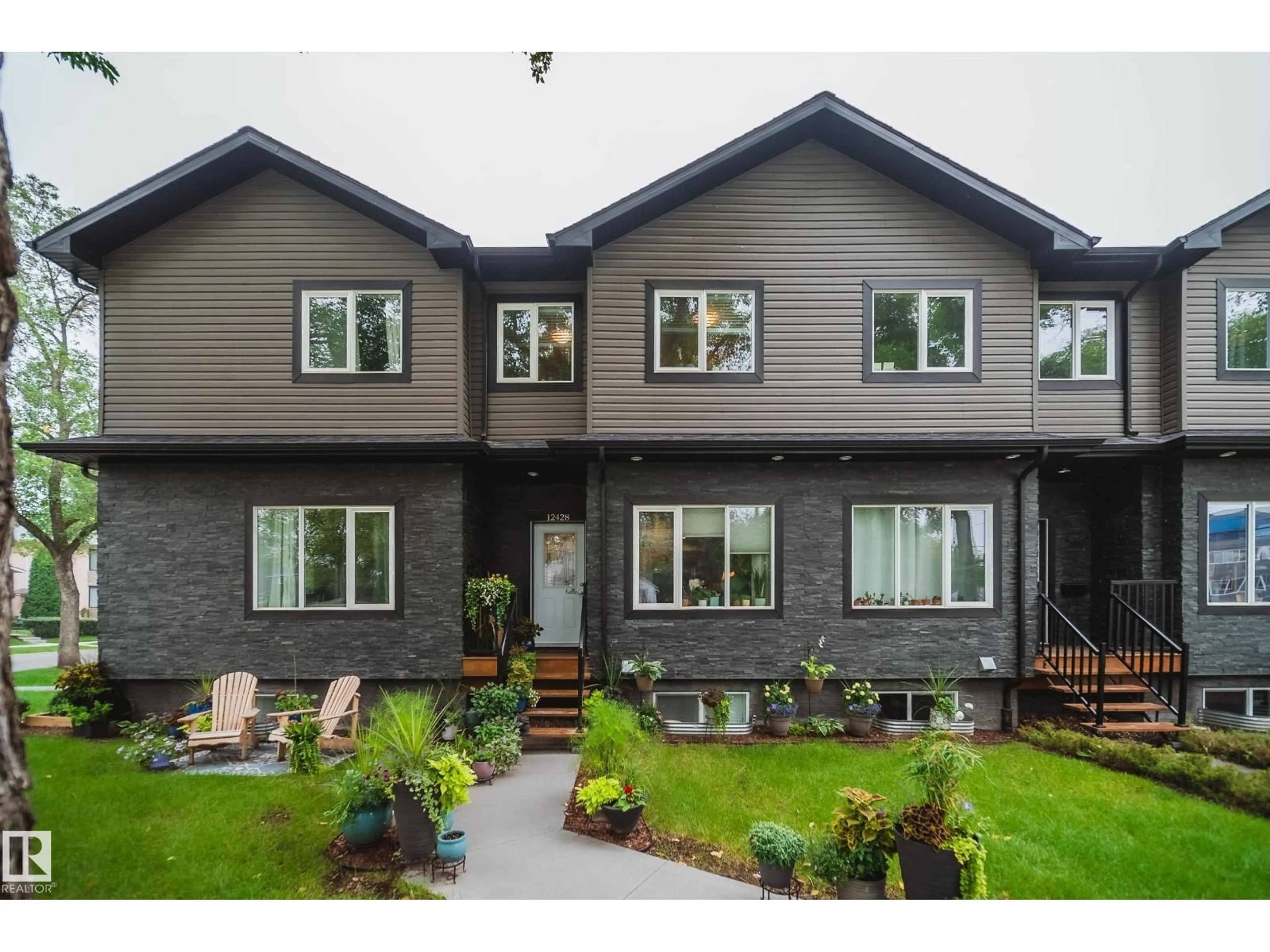 Home with brick exterior material, street for 12428 113 AV, Edmonton Alberta T5M2W5