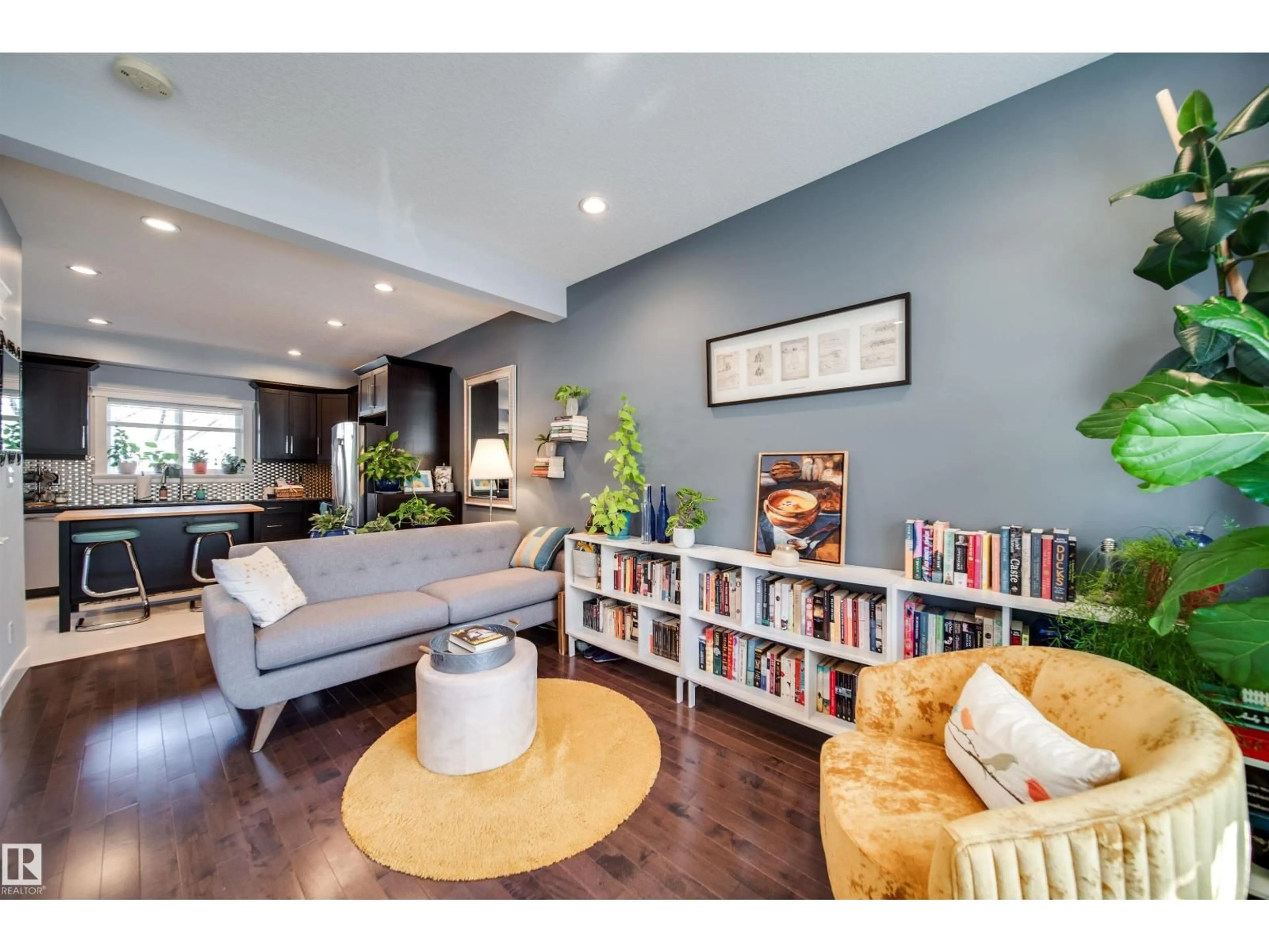 Living room with furniture, unknown for 12428 113 AV, Edmonton Alberta T5M2W5