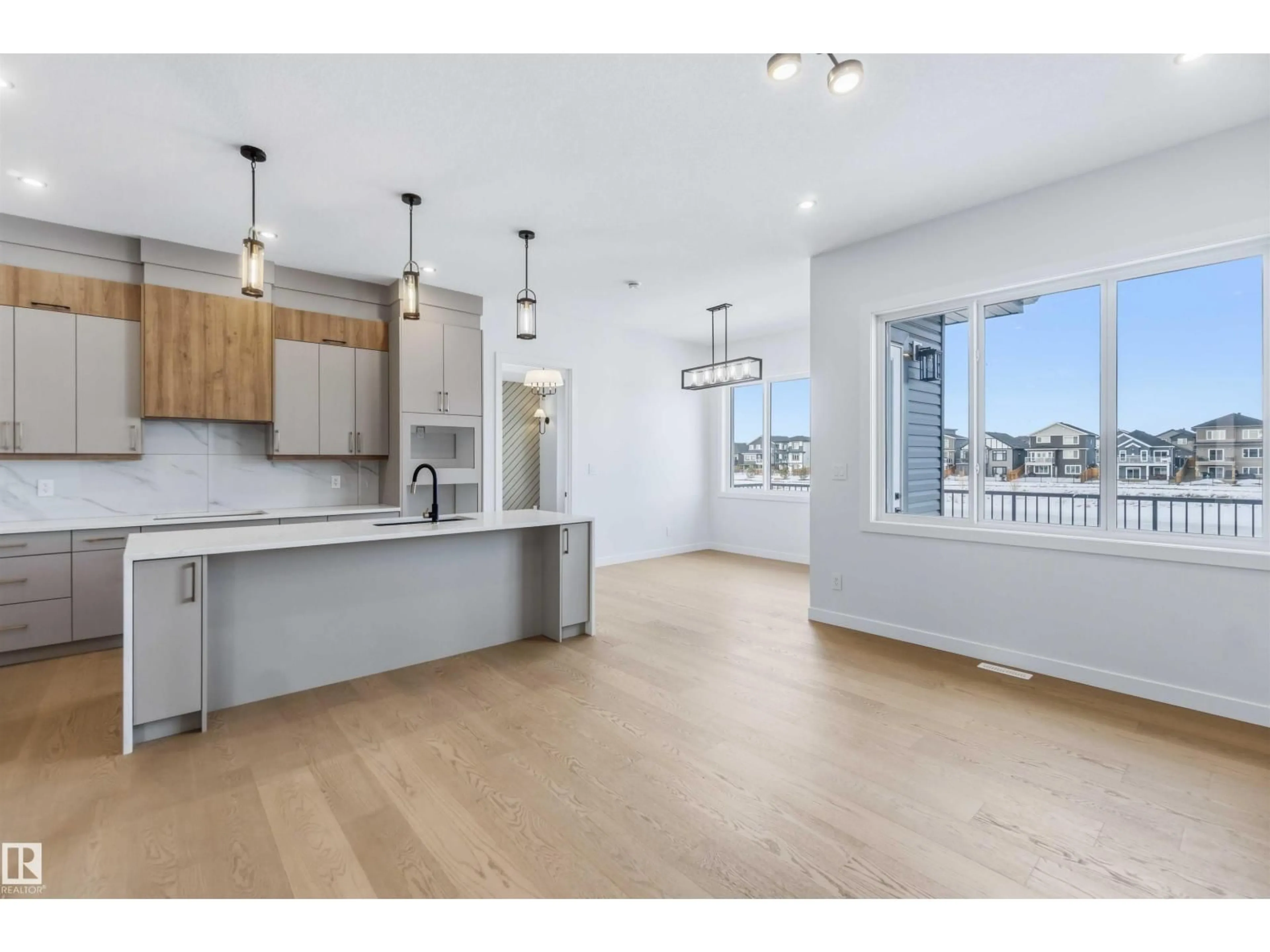 Open concept kitchen, wood/laminate floor for 72 ELDRIDGE PT, St. Albert Alberta T8N8C4