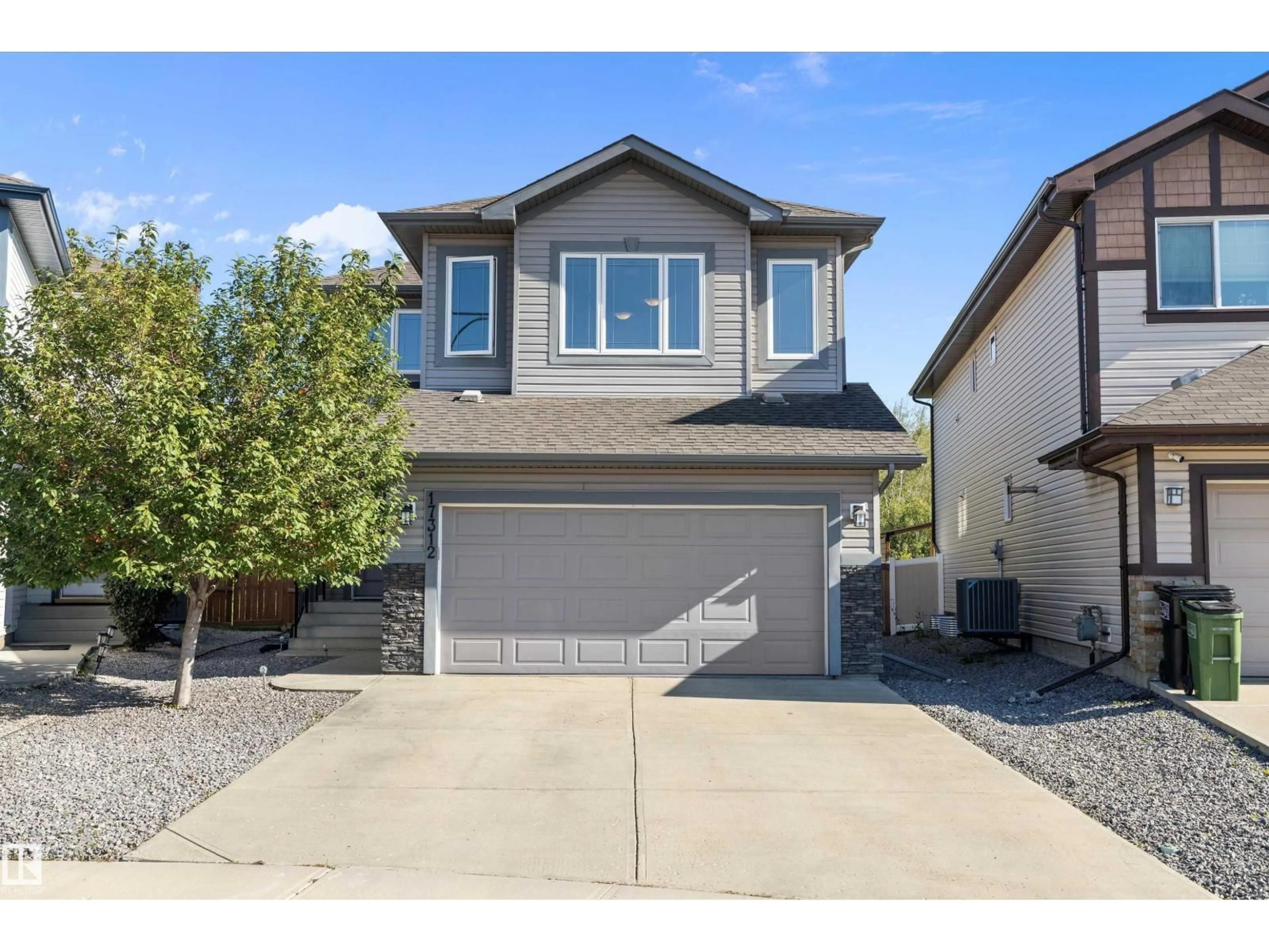 Home with vinyl exterior material, street for 17312 126 ST, Edmonton Alberta T5X0J9