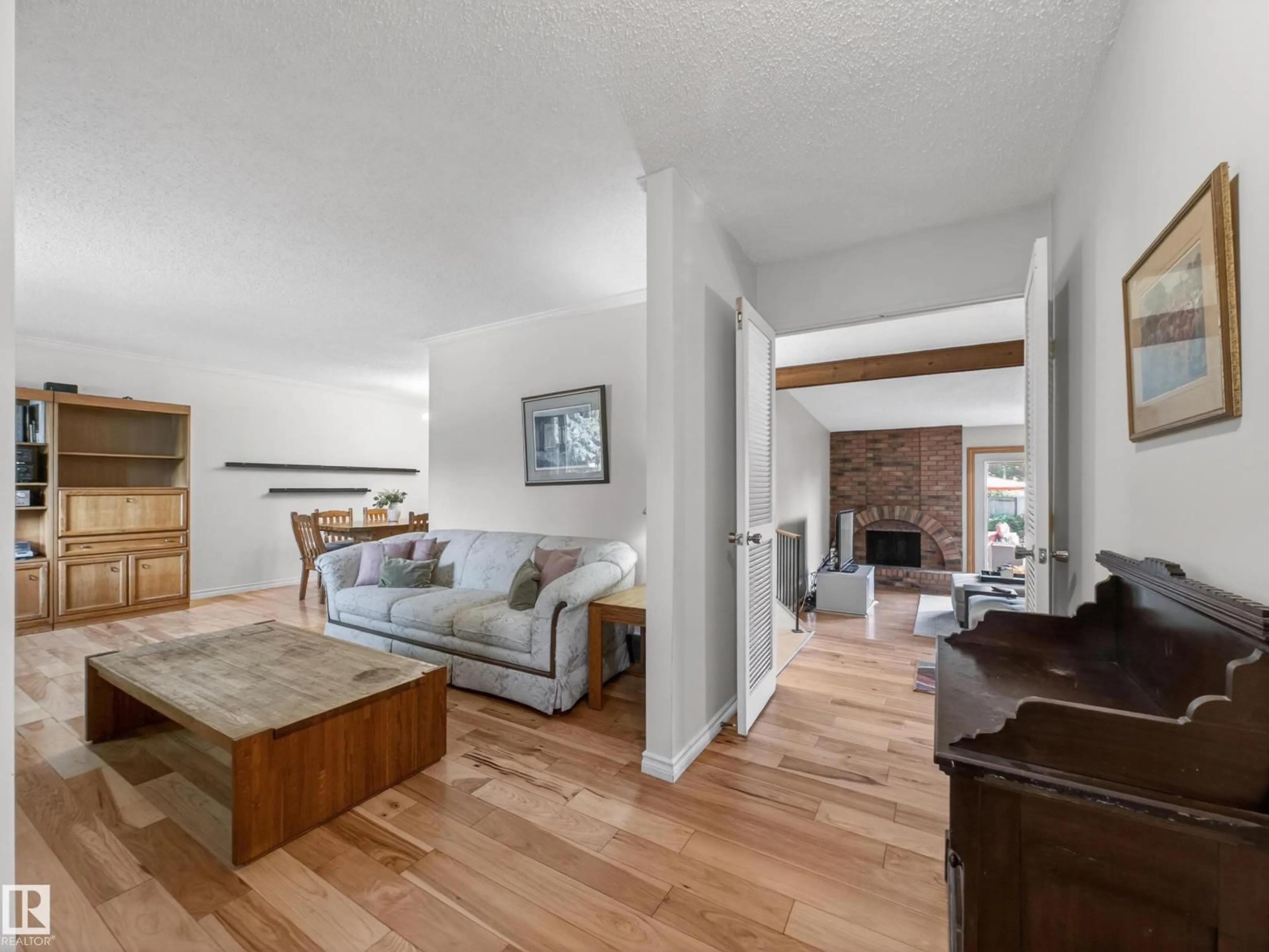 Living room with furniture, unknown for NW - 18416 90 AV, Edmonton Alberta T5T1N7