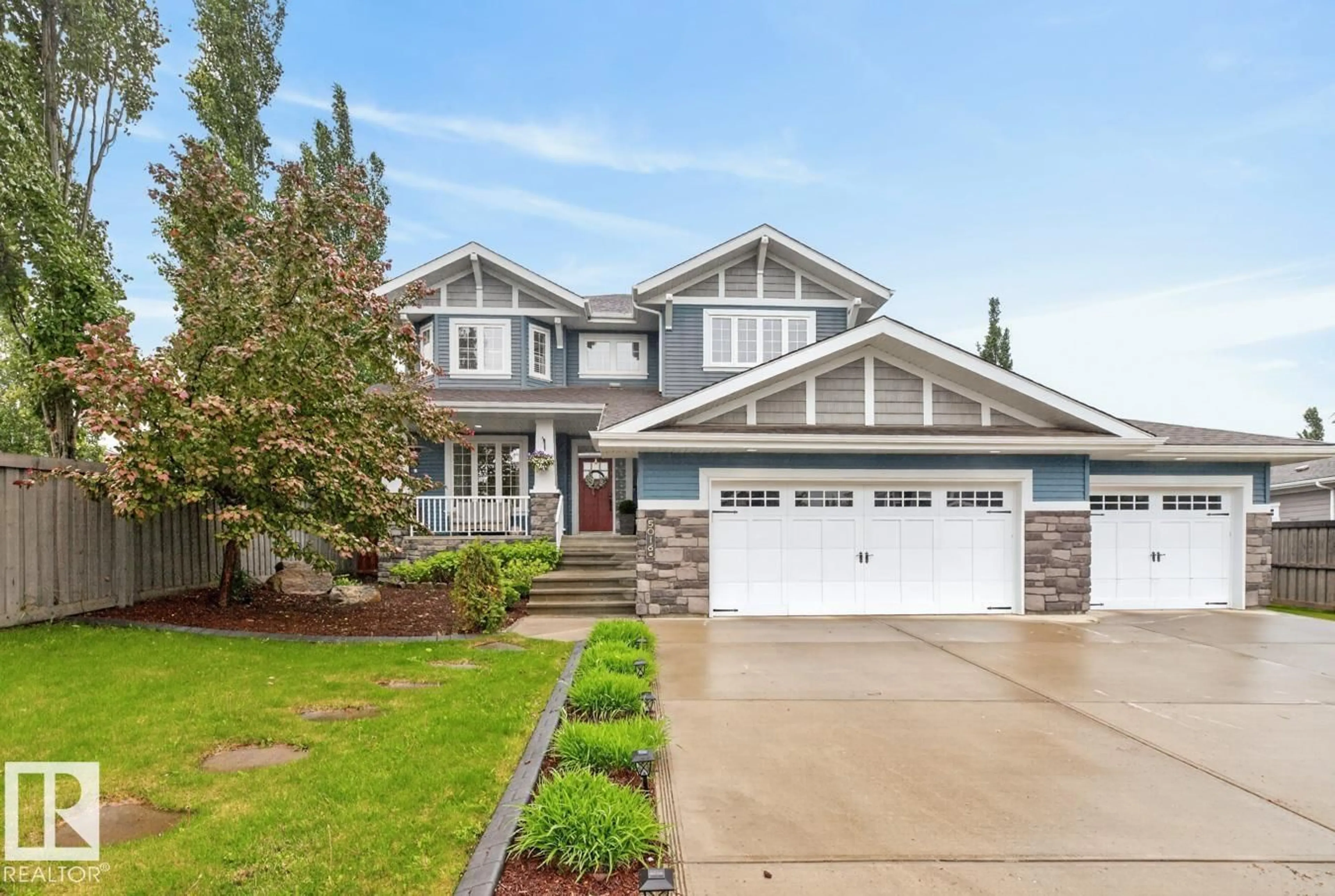 Home with vinyl exterior material, street for NW - 5016 213 ST, Edmonton Alberta T6M0G6