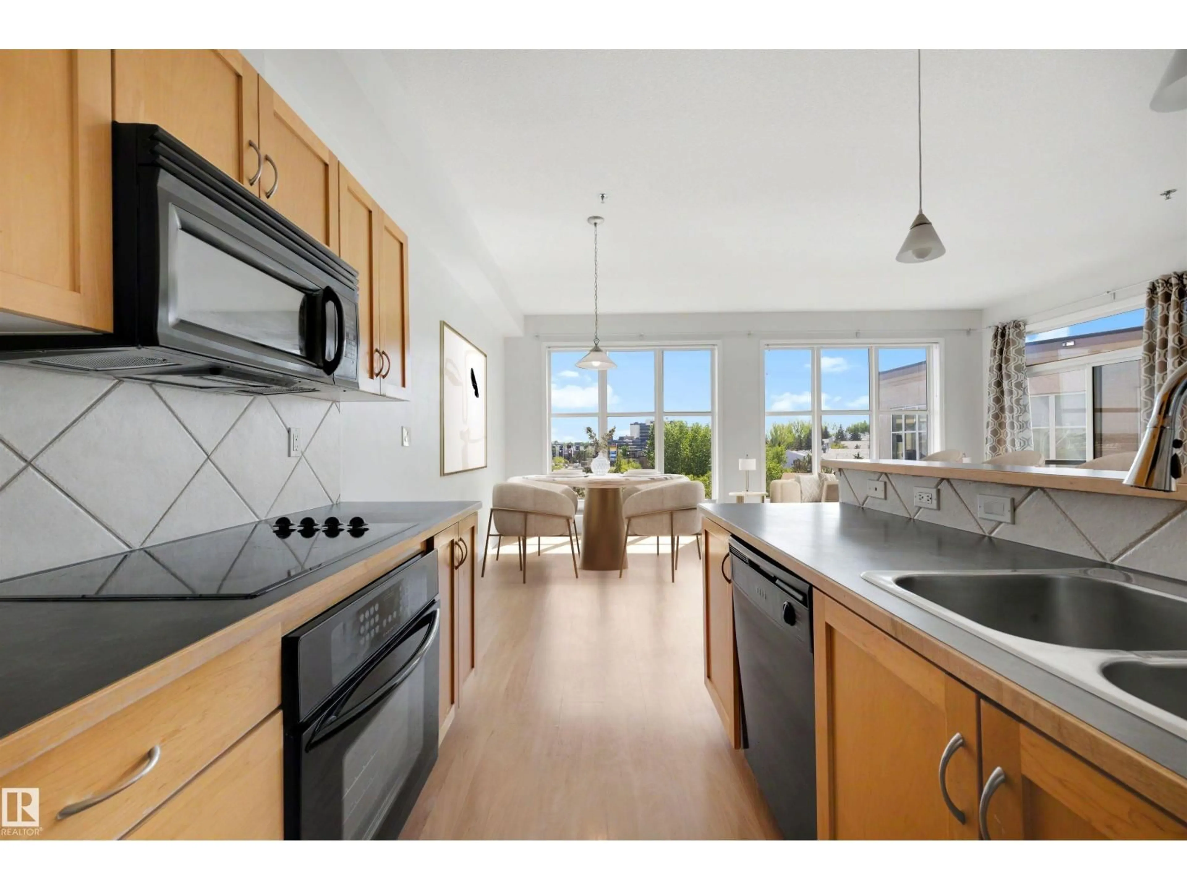 Open concept kitchen, unknown for #410 - 4835 104A ST, Edmonton Alberta T6H0R5
