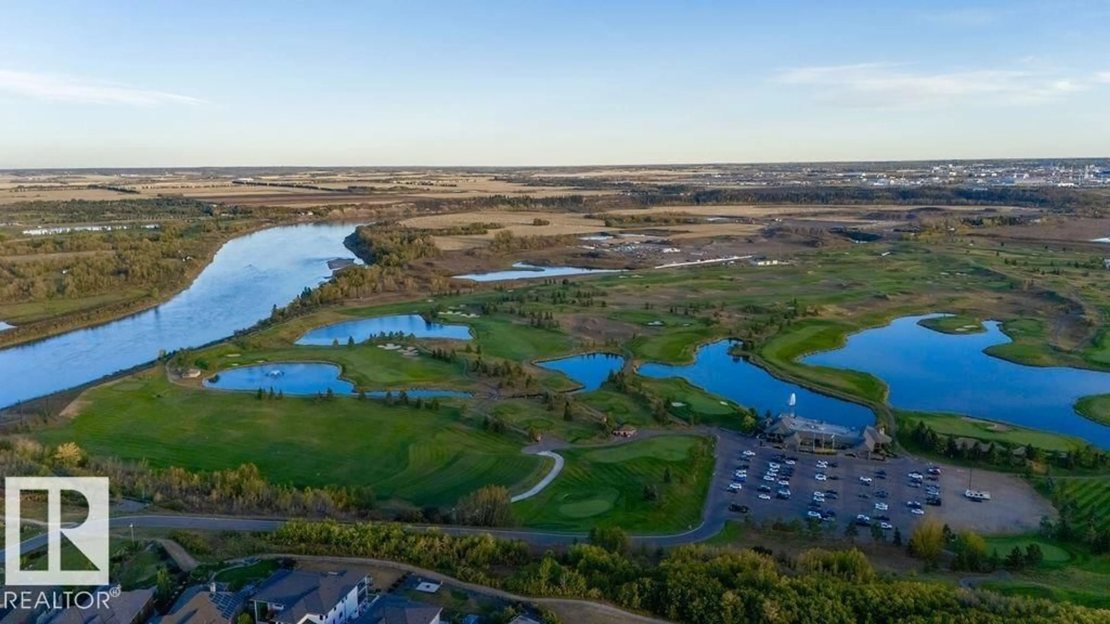 A pic from outside/outdoor area/front of a property/back of a property/a pic from drone, water/lake/river/ocean view for NE - 16607 8 ST, Edmonton Alberta T5Y4J1