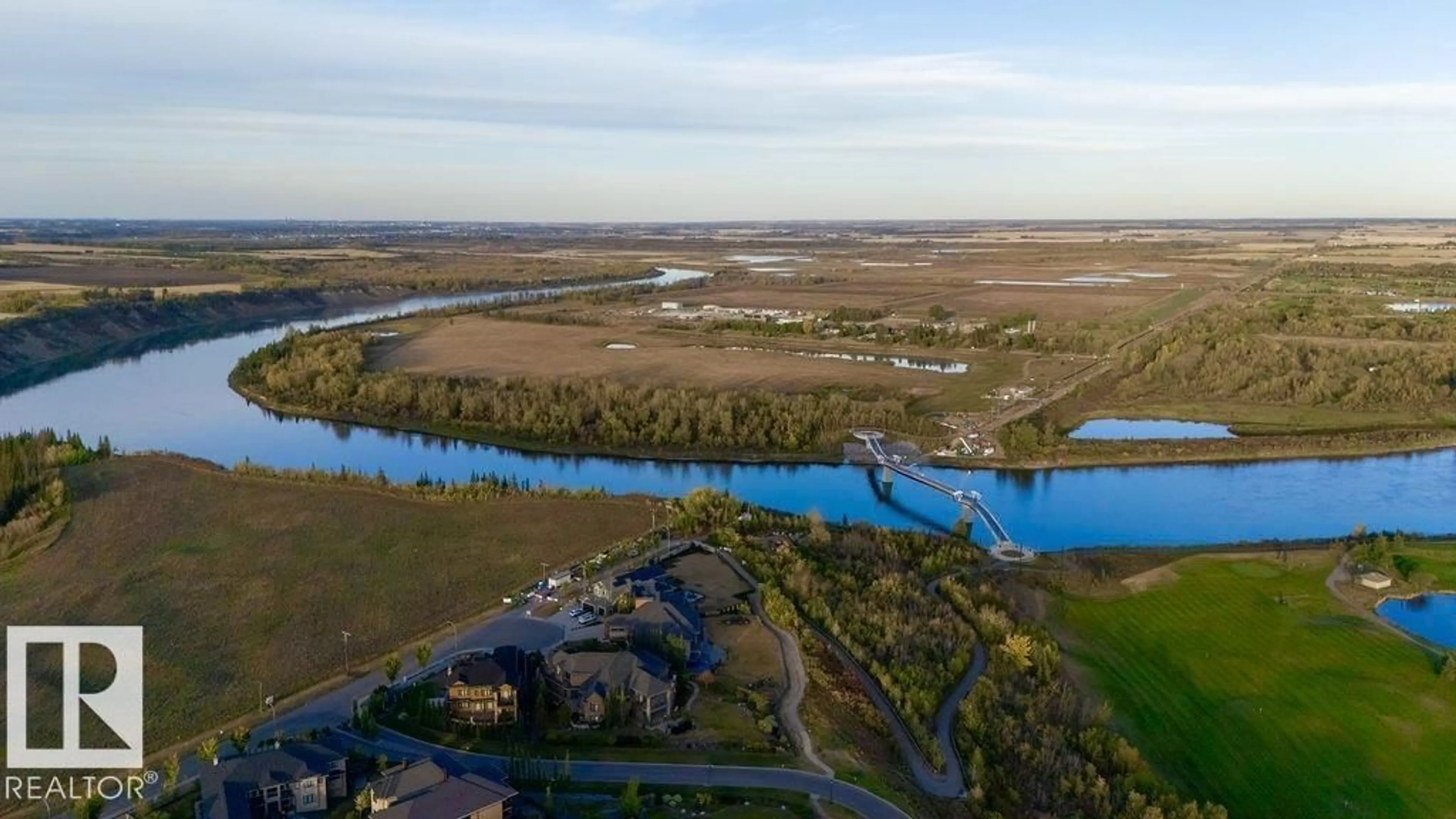 A pic from outside/outdoor area/front of a property/back of a property/a pic from drone, water/lake/river/ocean view for NE - 16607 8 ST, Edmonton Alberta T5Y4J1