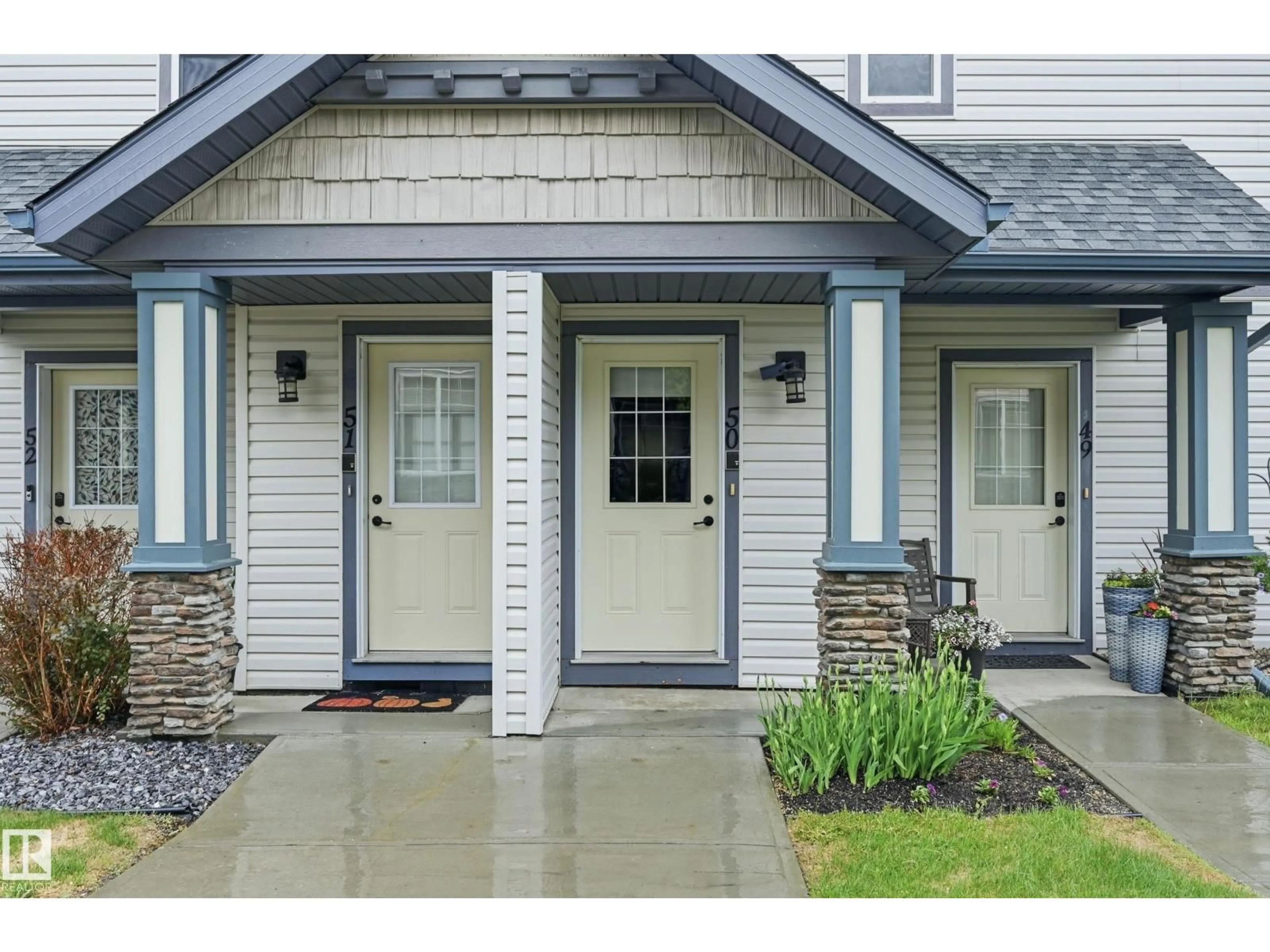 Home with vinyl exterior material, street for 50 - 2565 HANNA CR, Edmonton Alberta T6R3P7