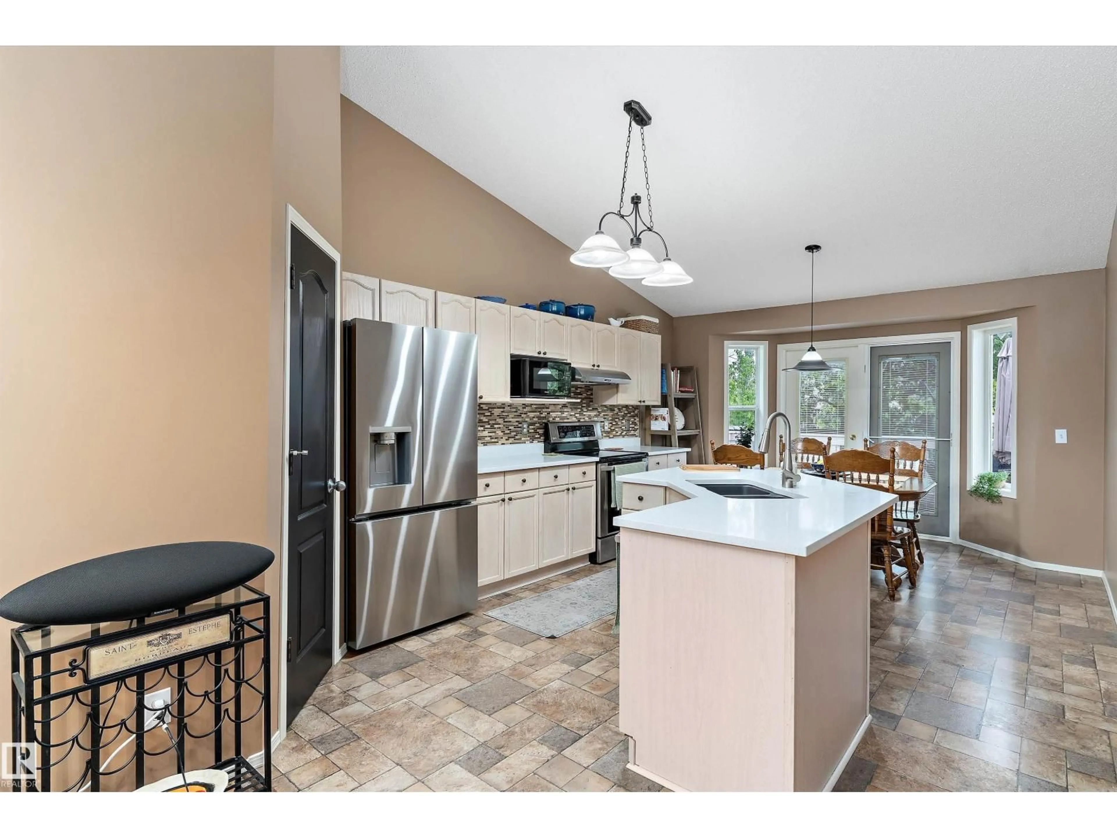 Open concept kitchen, ceramic/tile floor for 12811 161 AV, Edmonton Alberta T6V1M8