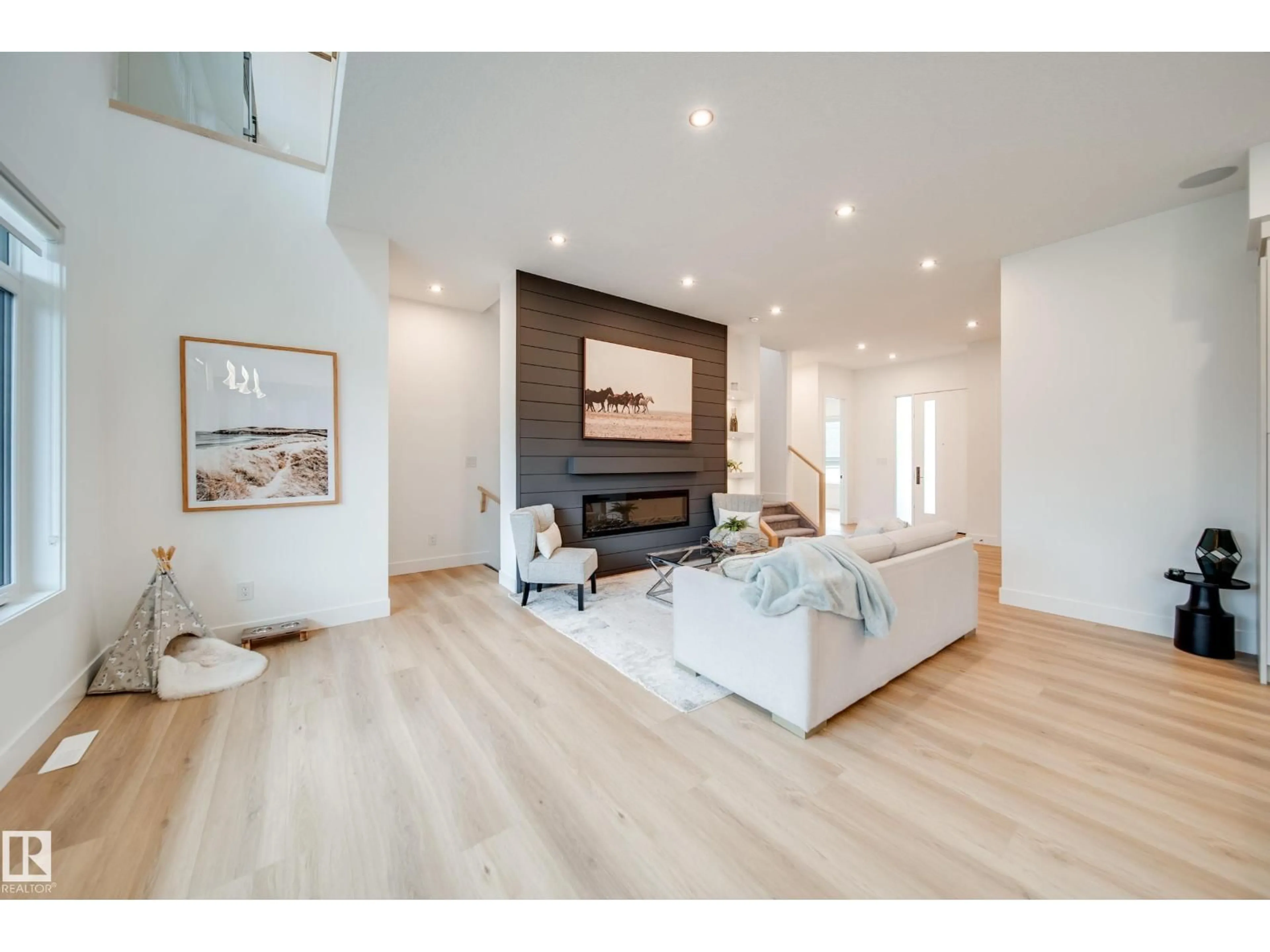 Living room with furniture, wood/laminate floor for #42 - 20425 93 AV, Edmonton Alberta T5T7C7