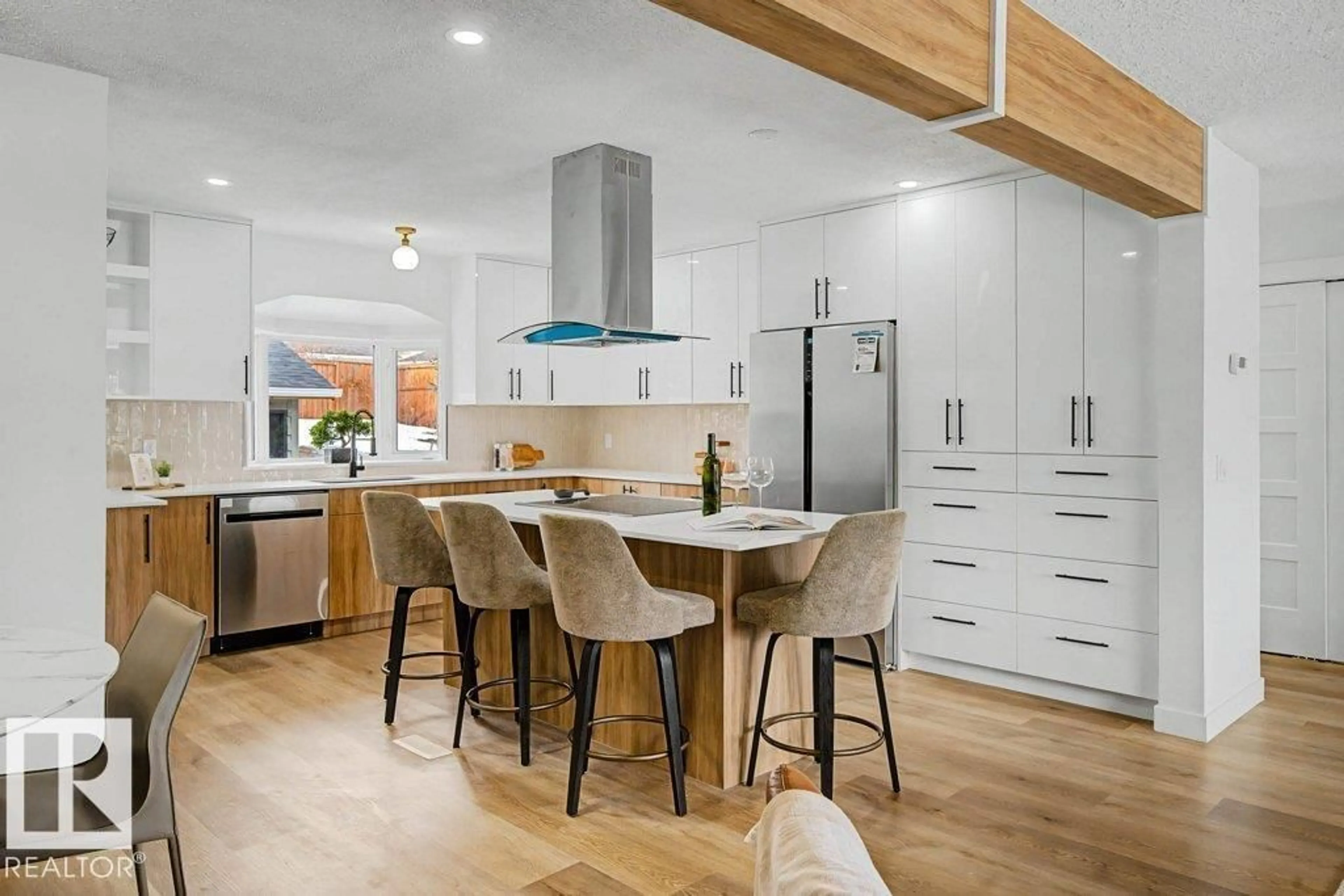 Open concept kitchen, wood/laminate floor for 49 GALLOWAY DR, Sherwood Park Alberta T8A2M1