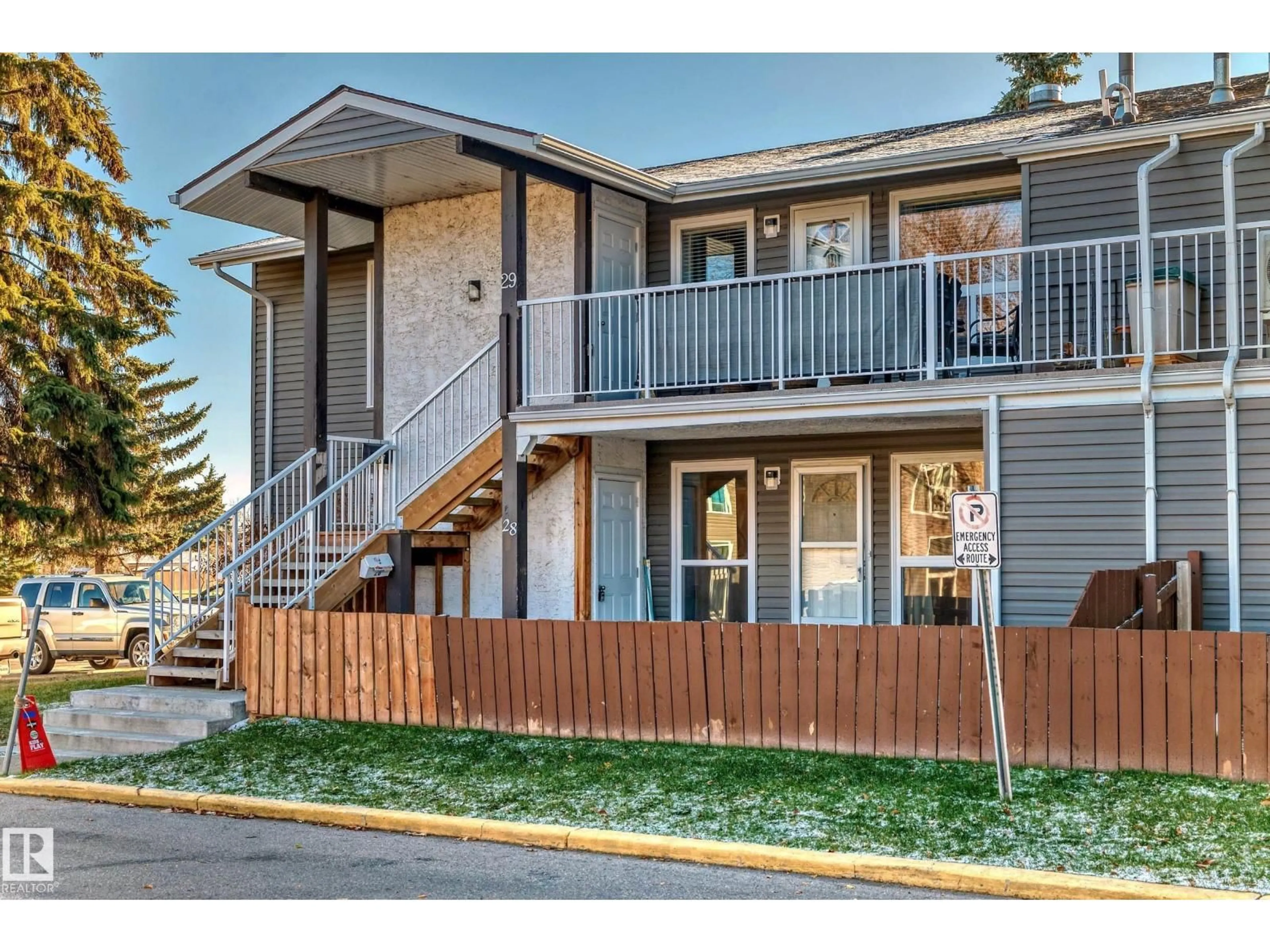 Home with vinyl exterior material, street for 28 - 3111 142 AV, Edmonton Alberta T5Y2H6